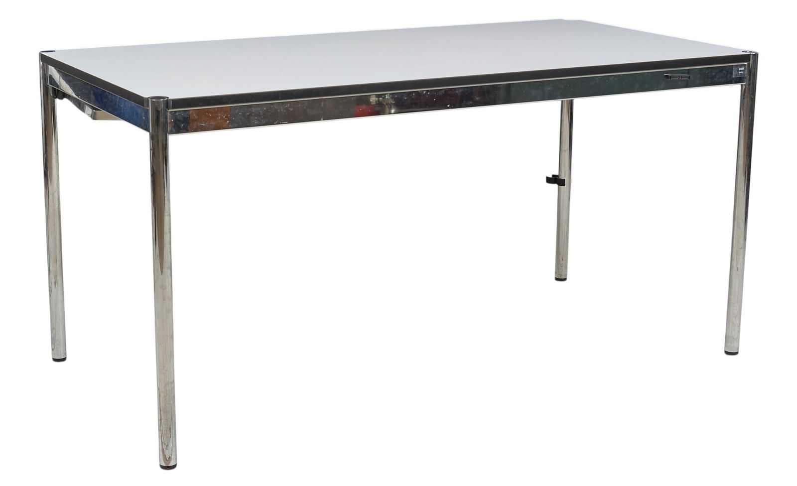 USM Haller Table: Haller rectangular table by Fritz Haller for USM Modular, with chrome frame and table legs, and pearl gray white laminate topheight 29 in. x width 59 in. x depth 30 in. Provenance: Property