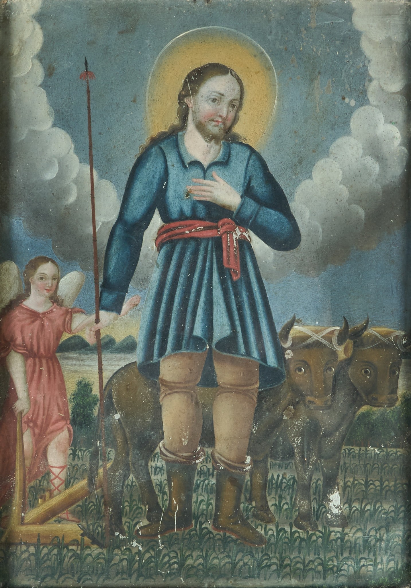 Antique Mexican Retablo, San Isidro Labrador: Framed antique Mexican retablo depicting San Isidro Labrador (Saint Isidore the Farmer), oil on tin, circa 19th century height 17 in. x width 13.5 in. x depth 5 in. Provenance: The Estate c