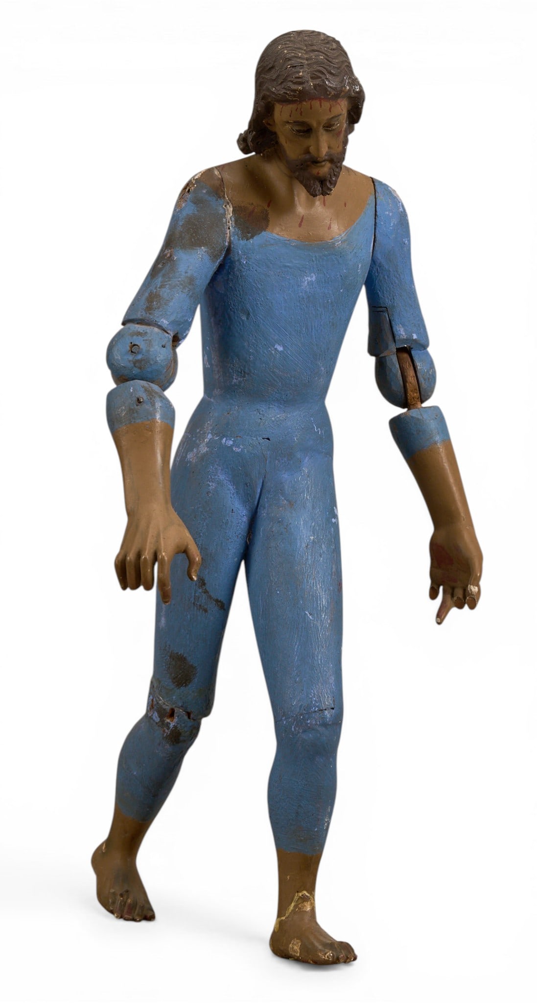 Antique Christ Santo: Antique hand-carved and painted Mexican santo depicting Jesus Christ, with articulated arms, circa 19th century height 17 in. x width 8.5 in. x depth 8.5 in Provenance: The Estate collection of