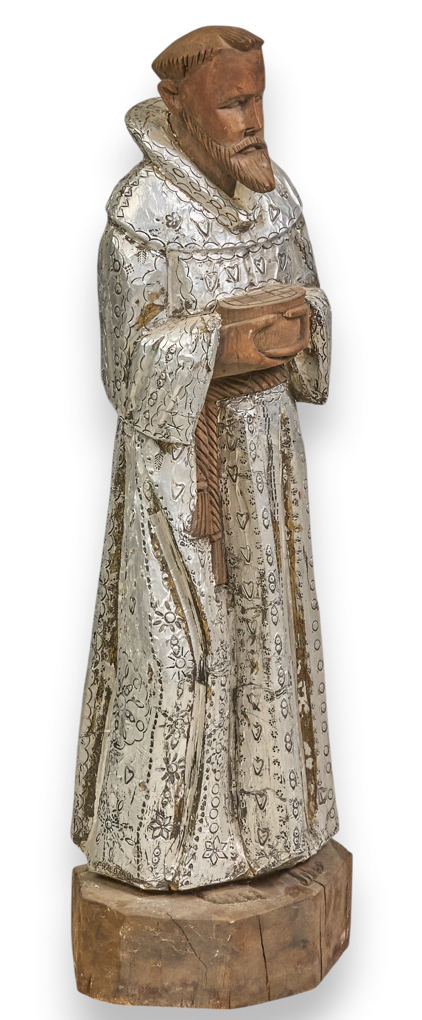 Vintage Carved Santo: Vintage hand-carved wooden santo with silver paint finish, circa early 20th century height 32 in. x width 10 in. x depth 9 in. Provenance: Property from a home in San Antonio, Texas