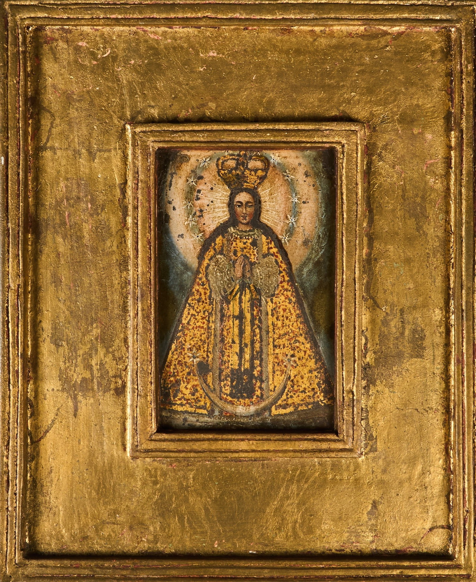 Framed Mexican Retablo, Virgin of Guadalupe: Framed Mexican retablo, depicting the Virgin of Guadalupe, oil on tin, housed in giltwood frame, circa 20th century height 14 in. x width 11.5 in. x depth 1 in. Provenance: The Estate collection of la