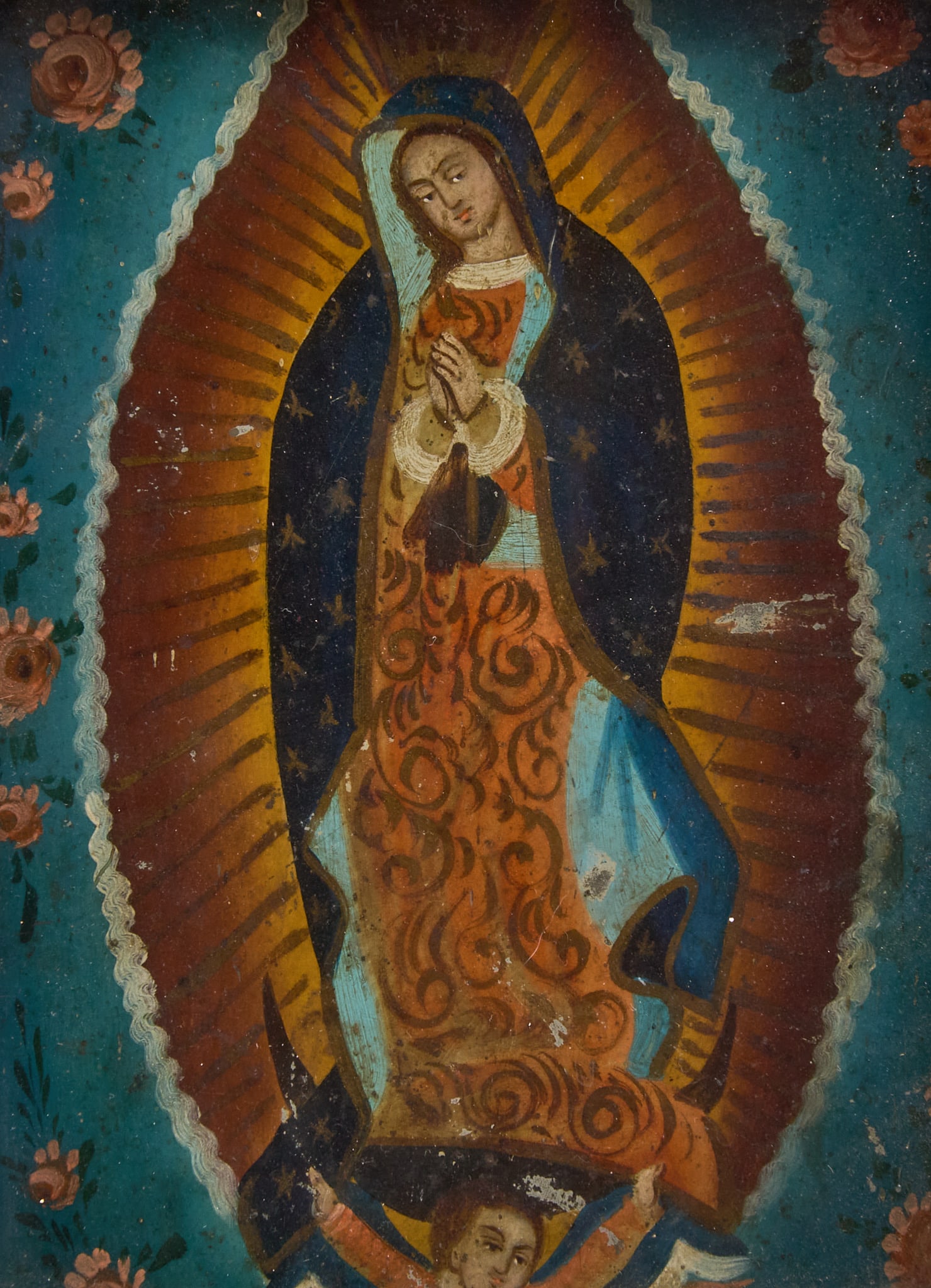 Antique Mexican Retablo, La Virgen de Guadalupe: Antique Mexican retablo depicting la Virgen de Guadalupe, oil on tin, circa 19th century, housed in decorative metal frame height 16.5 in. x width 11 in. x depth 1.5 in. Provenance: The Es