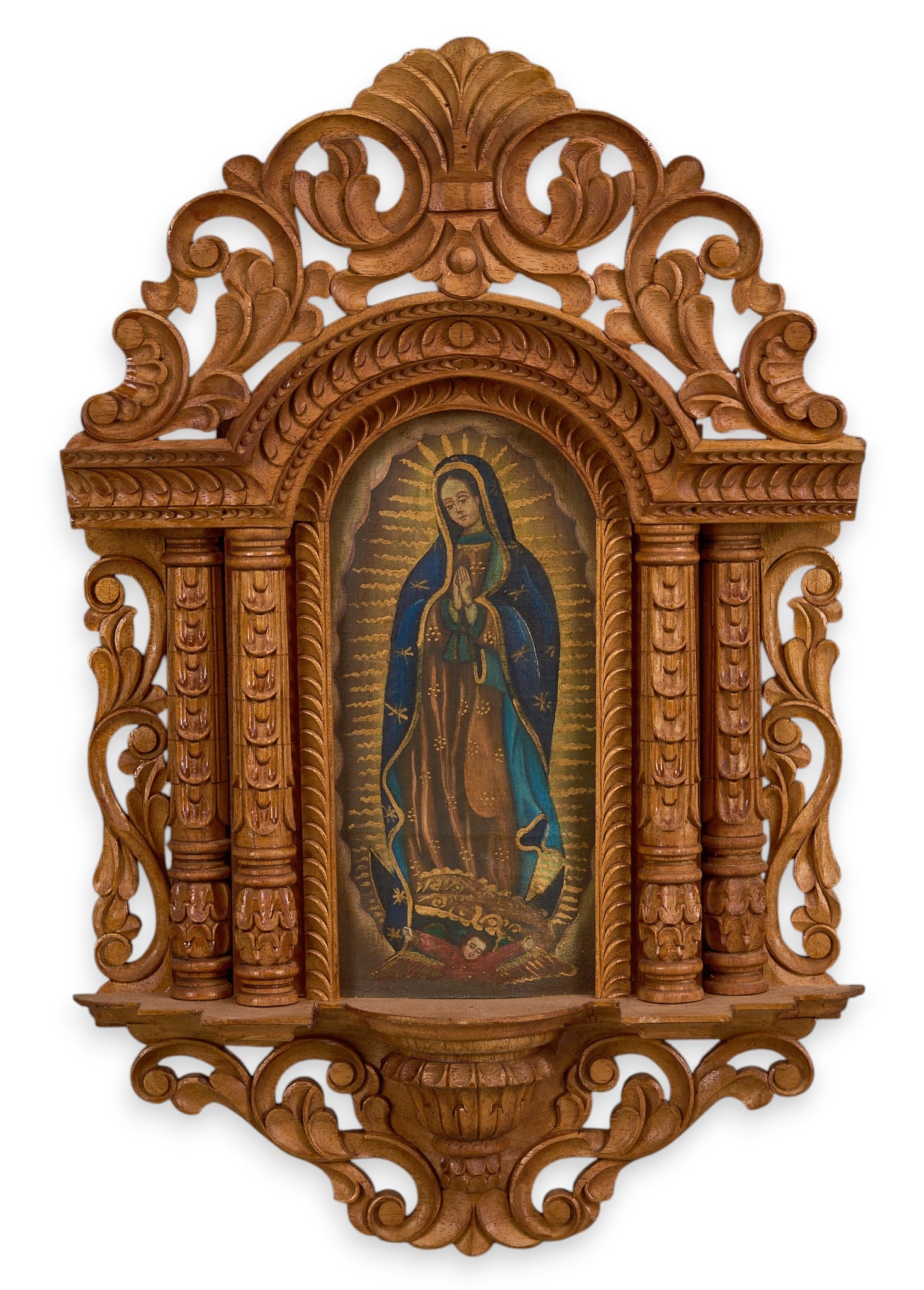 Virgen De Guadelupe Nicho: Vintage decoratively carved wooden Mexican nicho housing painted depiction of la Virgen De Guadalupe, oil on wood height 18 in. x width 11.75 in. x depth 2.5 in. Provenance: The Estate collectio