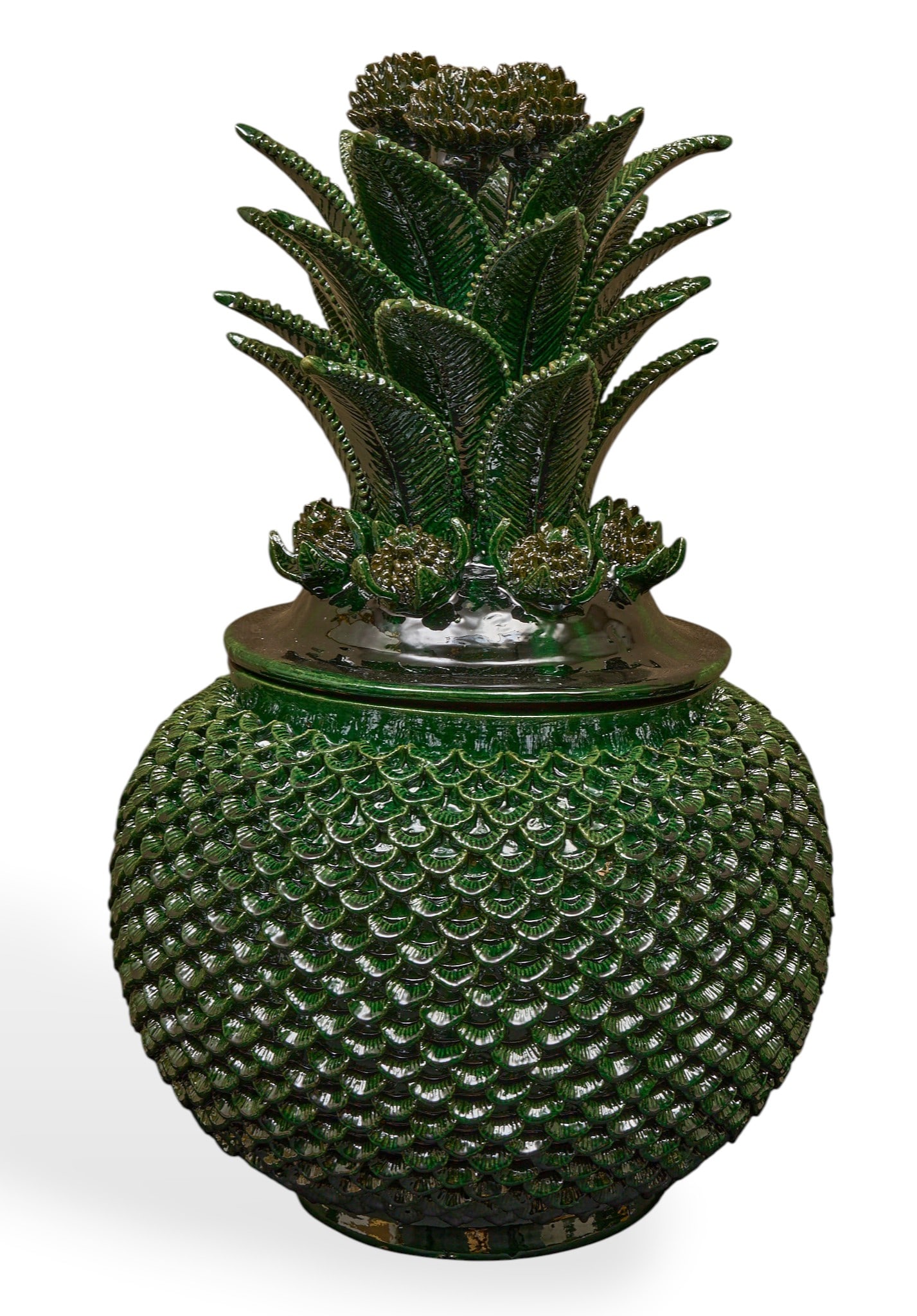 Pina de Conchitas: Michoacan greenware pina de conchitas (pineapple with shells), hand-sculpted and glazed ceramic vessel numerous rows of hand-modeled leaf applique, and lid with stemmed blossoms and more leaf applique