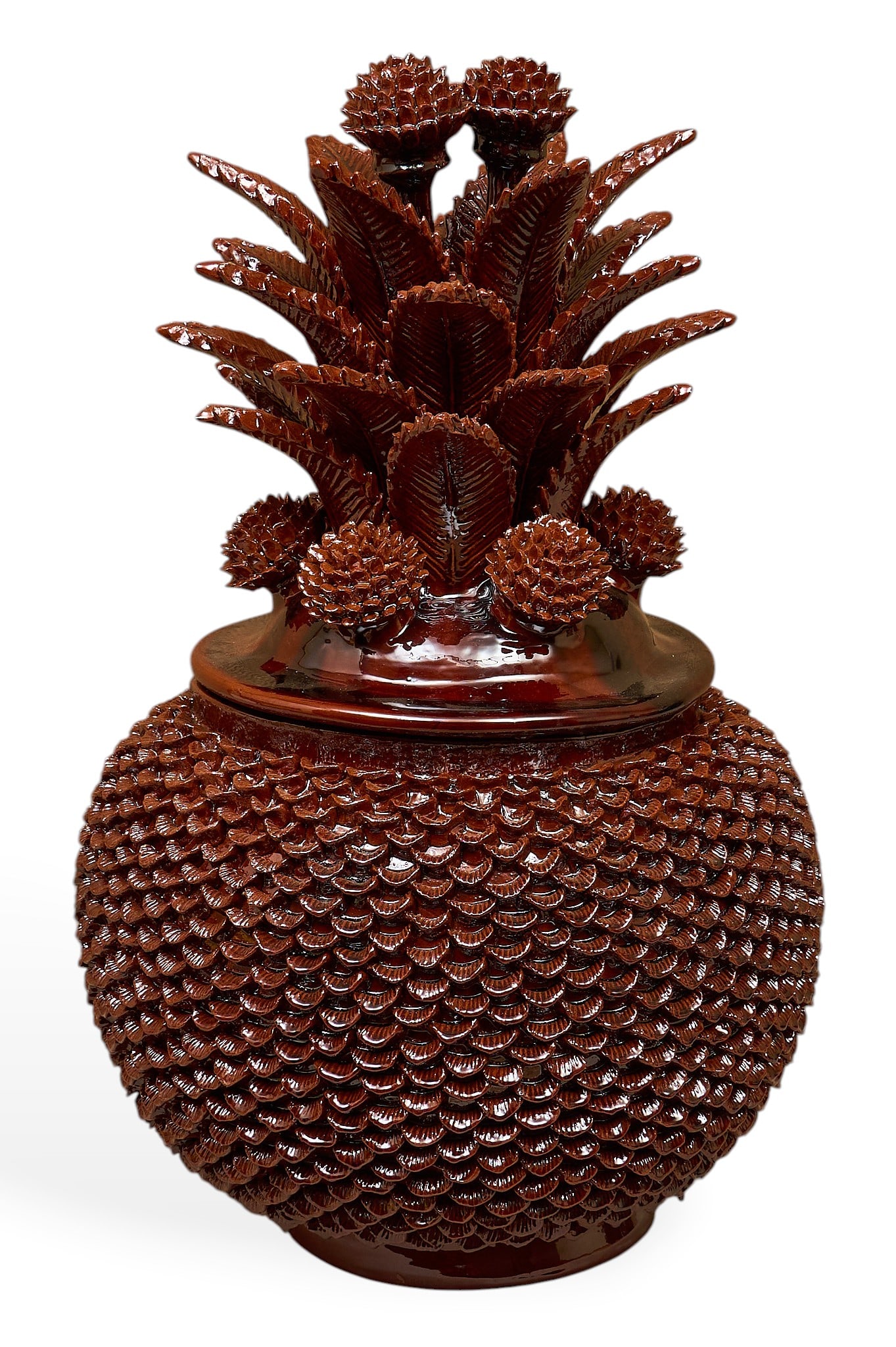 Pina de Conchitas: Michoacan pina de conchitas (pineapple with shells) hand-sculpted and glazed ceramic vessel with numerous rows of hand-modeled applique, and lid with stemmed blossoms and leaf applique 