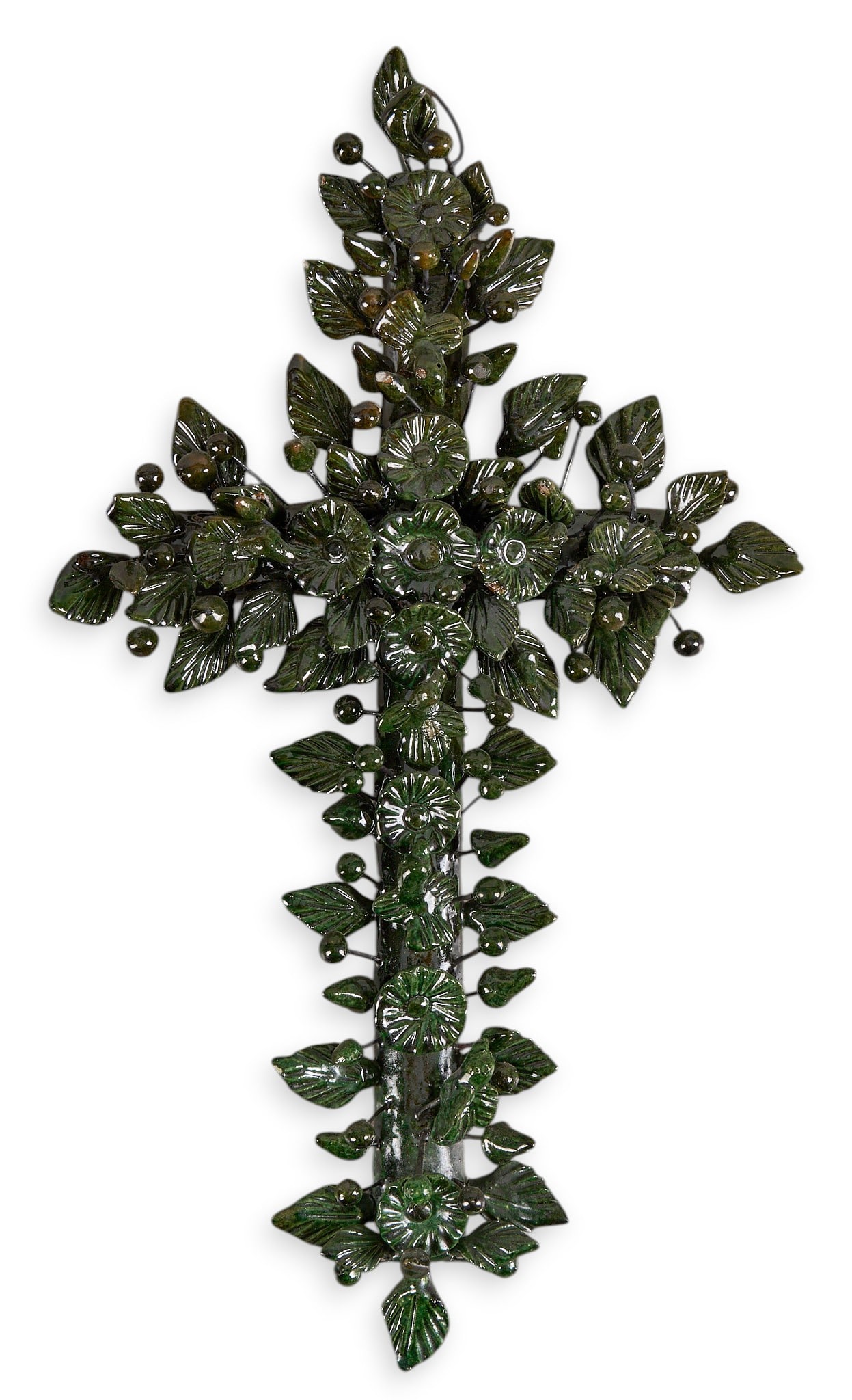 Michoacan Ceramic Cross: Hand-made Mexican (Michoacan) folk art ceramic cross with floral and foliate design, dark green glazing, and metal wire hardware, wired on back for hanging, circa 20th century height 16 in.