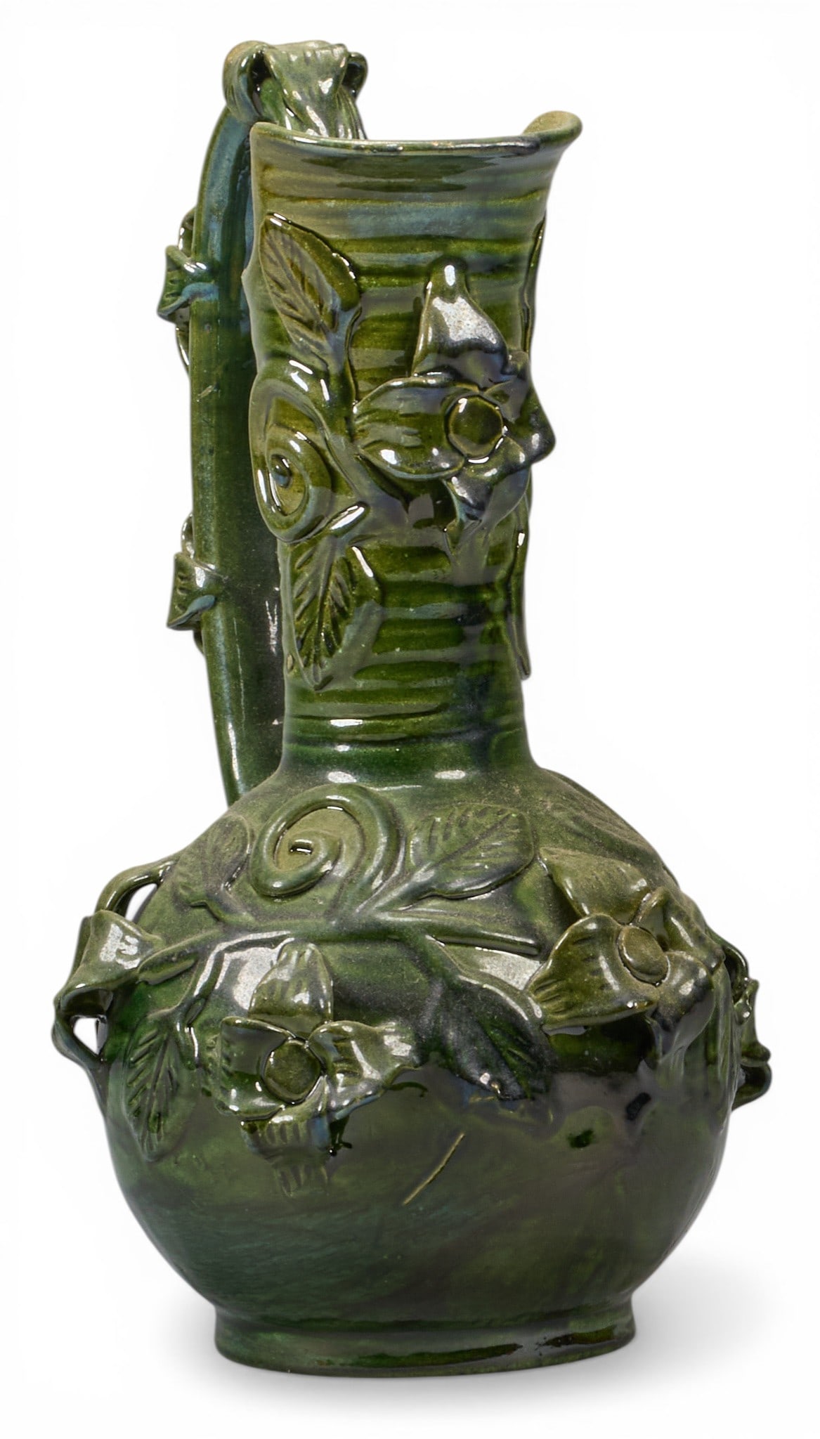 Vintage Michoacan Pitcher: Vintage hand-made and glazed Michoacan pitcher with botanical motifs, circa 20th century height 13 in. x width 7 in. x depth 7 in. Provenance: The Estate collection of late teacher and humanitar