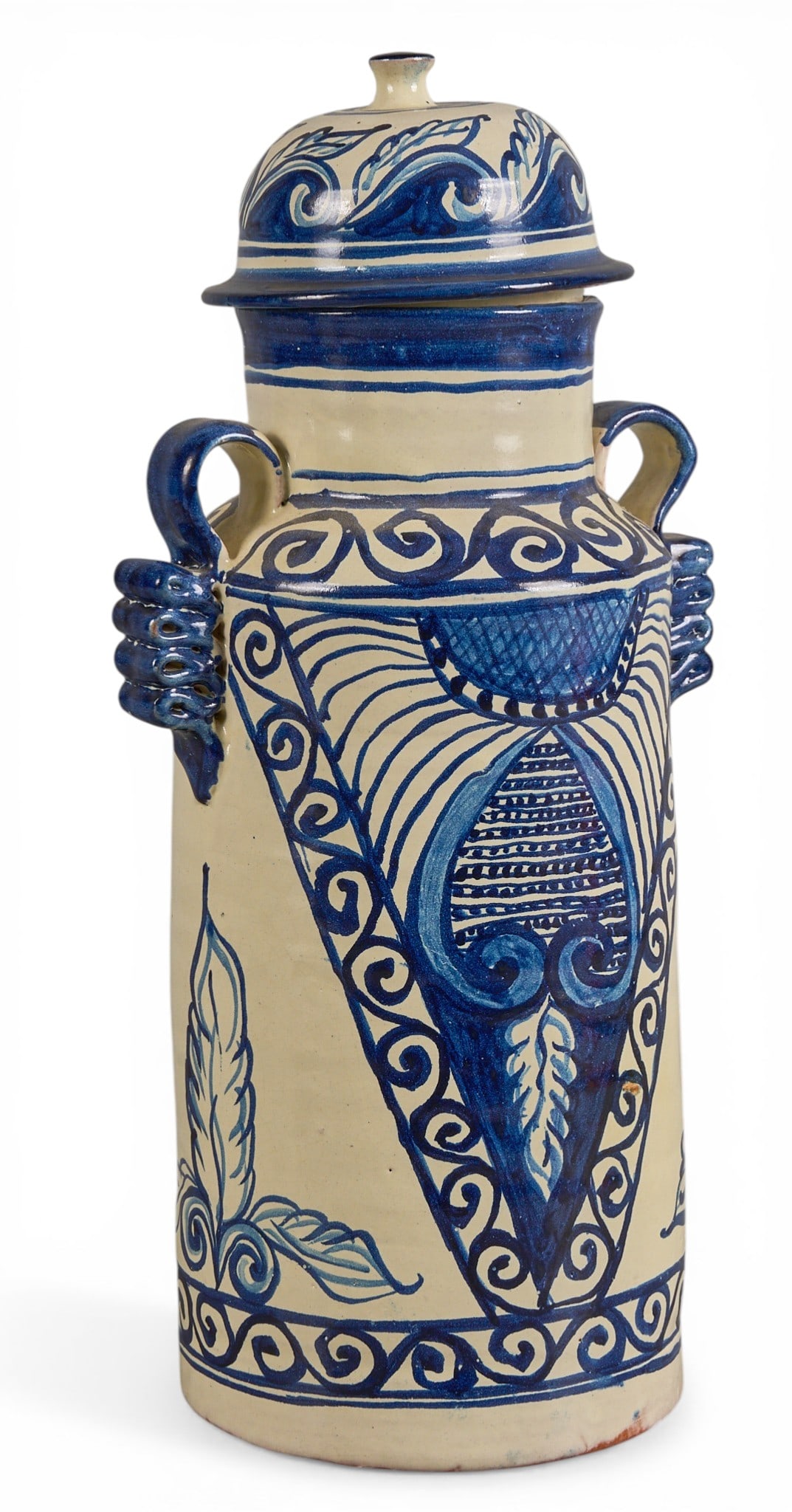 Talavera Vase: Vintage hand-made and painted Mexican Talavera jar with lid, and ribbon-form handles, circa 20th century height 16.5 in. x width 7.5 in. x depth 6 in. Provenance: The Estate collection of late teacher