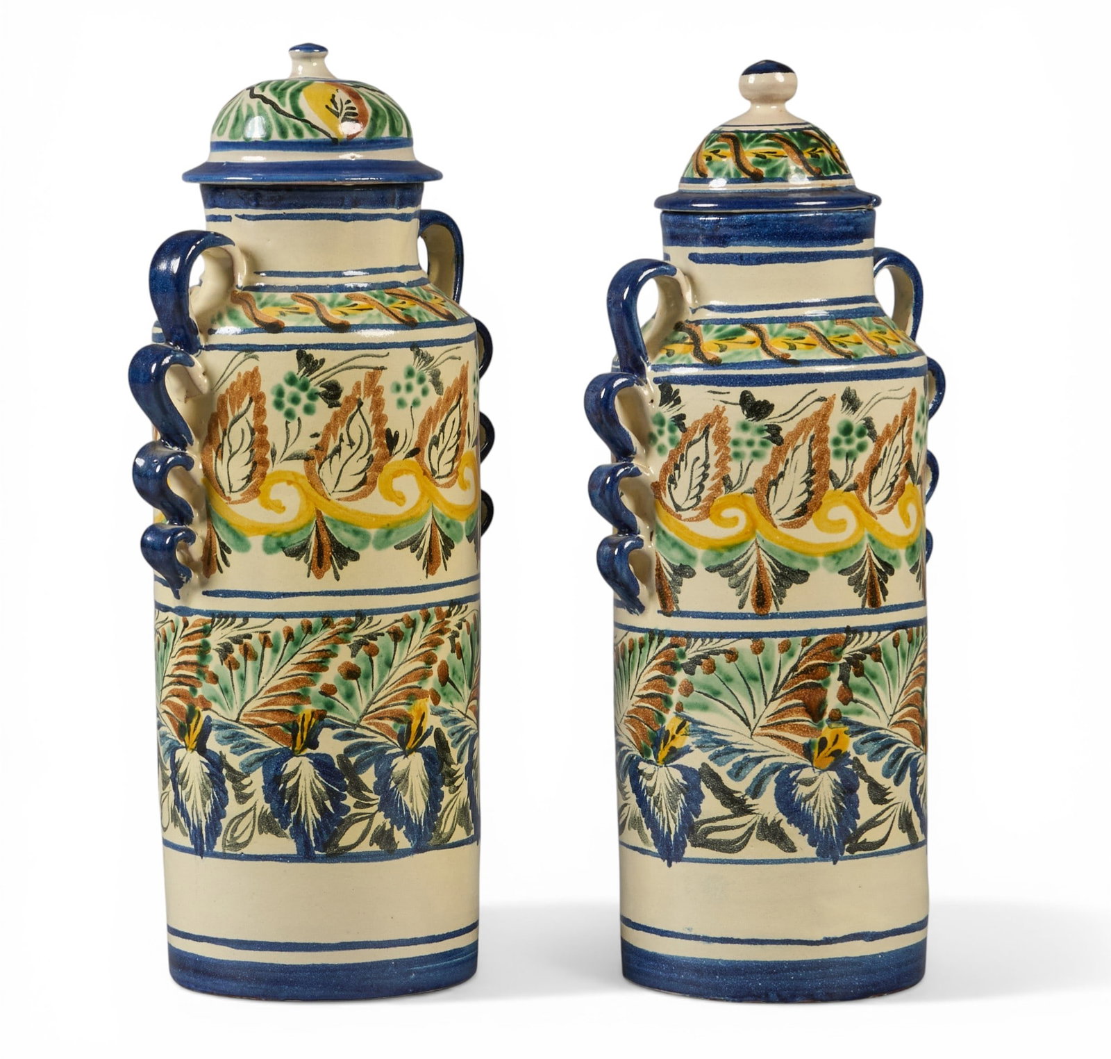 Pair of Vintage Talavera Jars: Pair of vintage hand-made and painted Mexican Talavera jars with lids, and ribbon handles, signed with "Santa Rosa, Guanajuato, Mexico" abbreviation on bottom, circa 20th century height