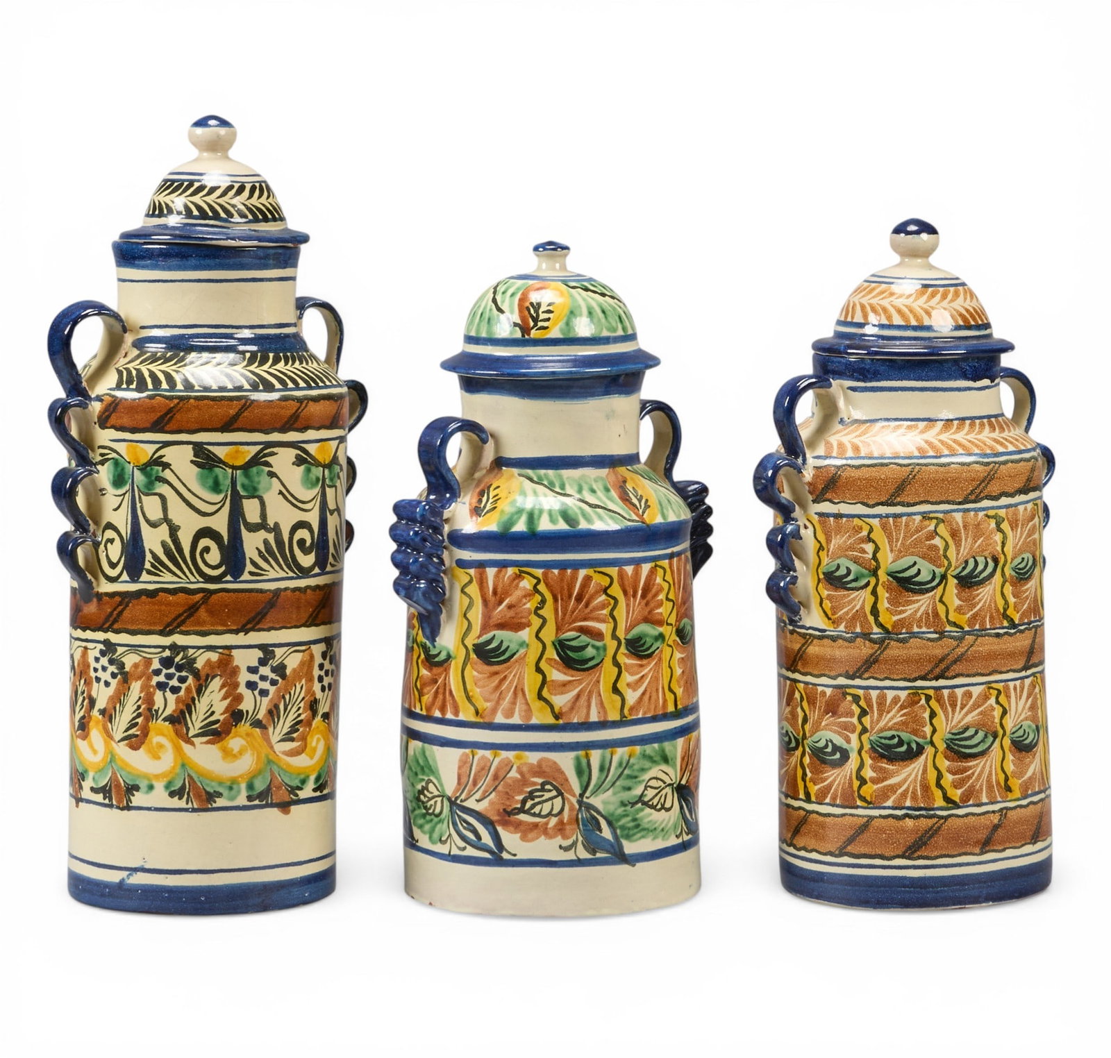 (3) Vintage Talavera Jars: Three vintage hand-made and painted Mexican Talavera jars with lids, and ribbon-form handles, circa 20th century height 16 in. x width 8 in. x depth 6 in. / largest Provenance: The Estate collec