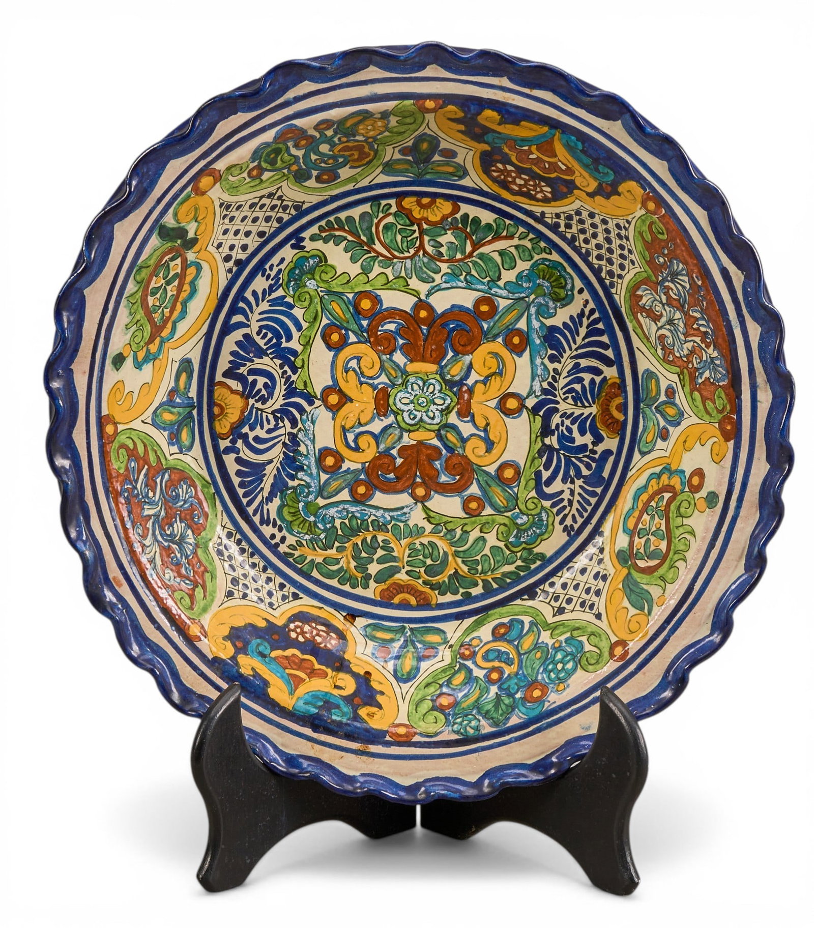 Vintage Mexican Talavera Serving Bowl: Vintage hand-made and painted Mexican Talavera serving bowl, circa 20th century, stand not included diameter 19.5 in. x depth 3.5 in. Provenance: The Estate collection of late teacher and 