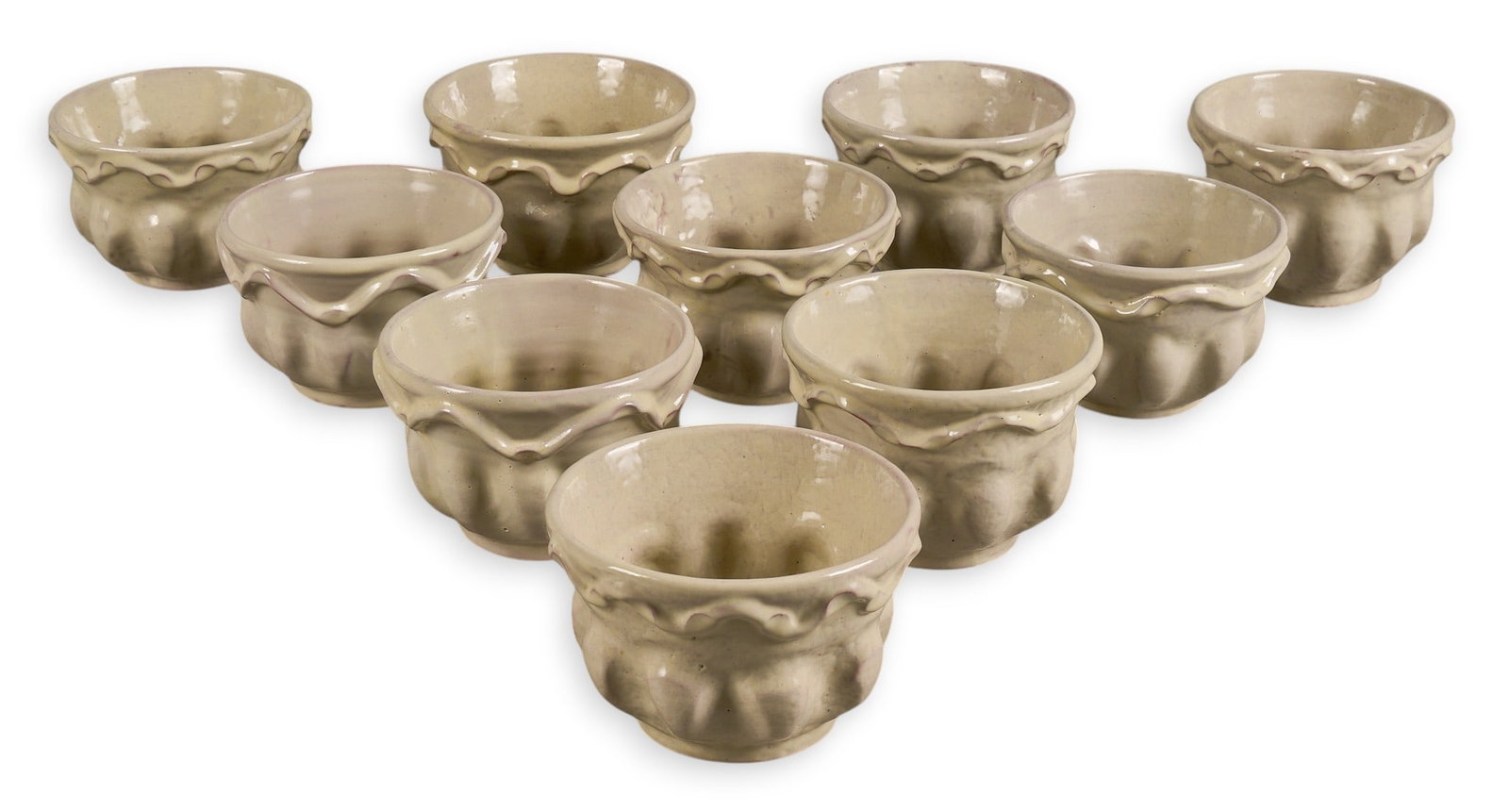 Gorky Gonzales, (10) Ceramic Cups: Collection of ten Gorky Gozales (Guanajuato, Mexico, b.1939) hand-made white-glazed ceramic cups, signed on bottom height 3.75 in. x width 5.5 in. x depth 5.5 in. / each Provenance: The Estate collect