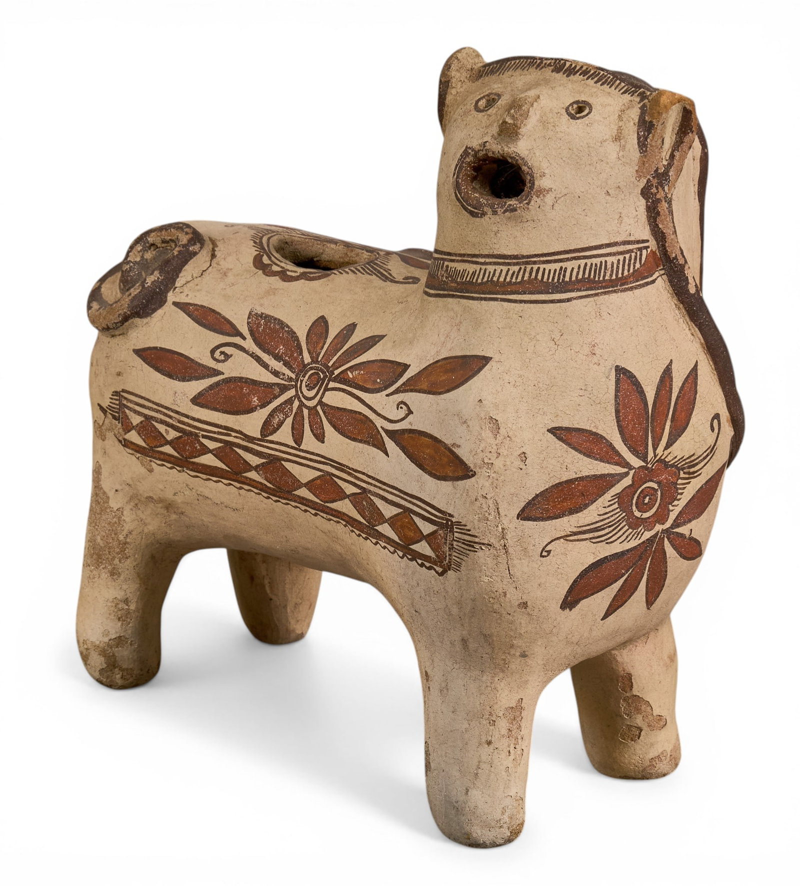 Mexican Pottery Nagual Figure: Mexican pottery nagual figure, decorated with painted floral and geometric designs in red height 8 in. x width 4 in. x depth 8 in. Provenance: Property from a home in San Antonio, Texas