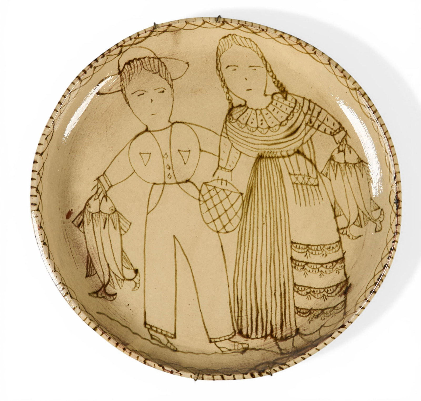 Tzintzuntzan Plate: Tzintzuntzan (Michoacán, Mexico) plate with hand-painted pastoral figuresdiameter 17 in. x depth 2 in. Provenance: The Estate collection of late teacher and humanitarian Douglas