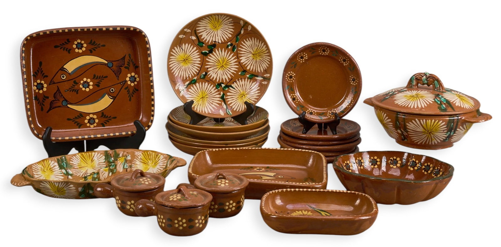 Collection of Vintage Tlaqupaque Ceramics: Collection of vintage Mexican Tlaquepaque ceramic dishes, hand-made and painted, circa early 20th century height 2 in. x width 12 in. x depth 10 in. / largest Provenance: Property from a