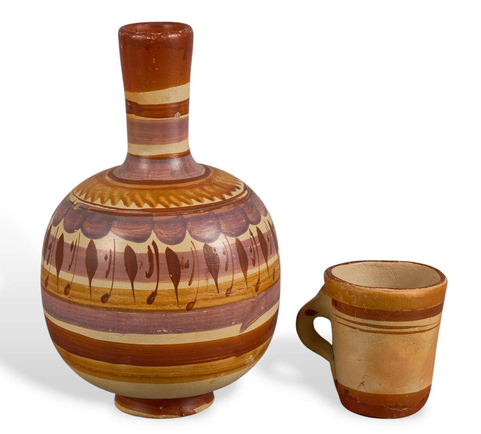 Vintage Mexican Water Jug with Cup: Vintage hand-made and painted Mexican ceramic water jug with cup, circa early 20th century height 13 in. x width 7.5 in. x depth 7.5 in. Provenance: Property from a home in Goldwaithe, Texas