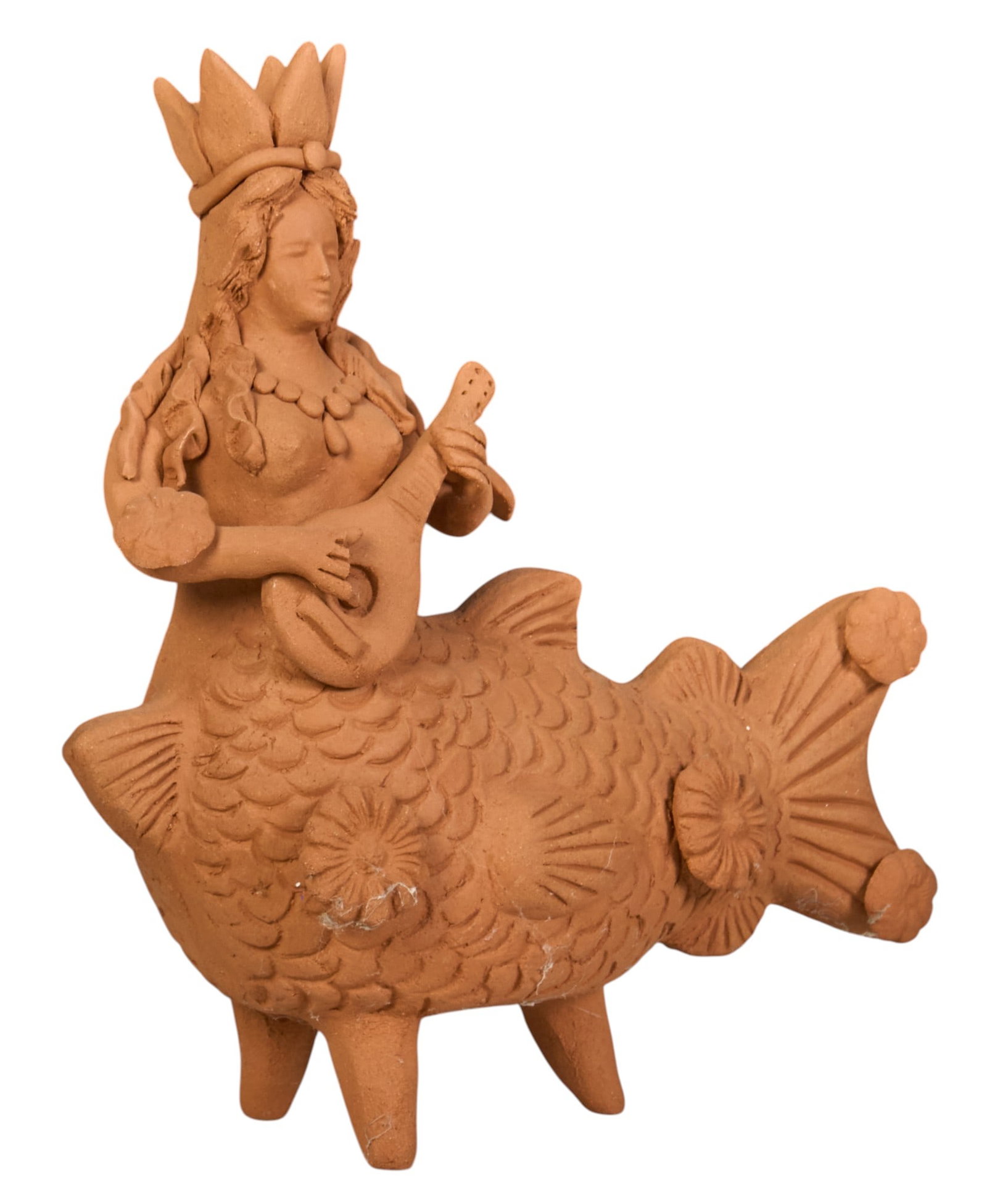 Oaxacan Sirena: Hand-made, unpainted Mexican (Oaxaca) sirena (mermaid) figure, supported on tripod legs, circa late 20th century height 10 in. x width 9 in. x depth 3 in. Provenance: The Estate collection of late tea