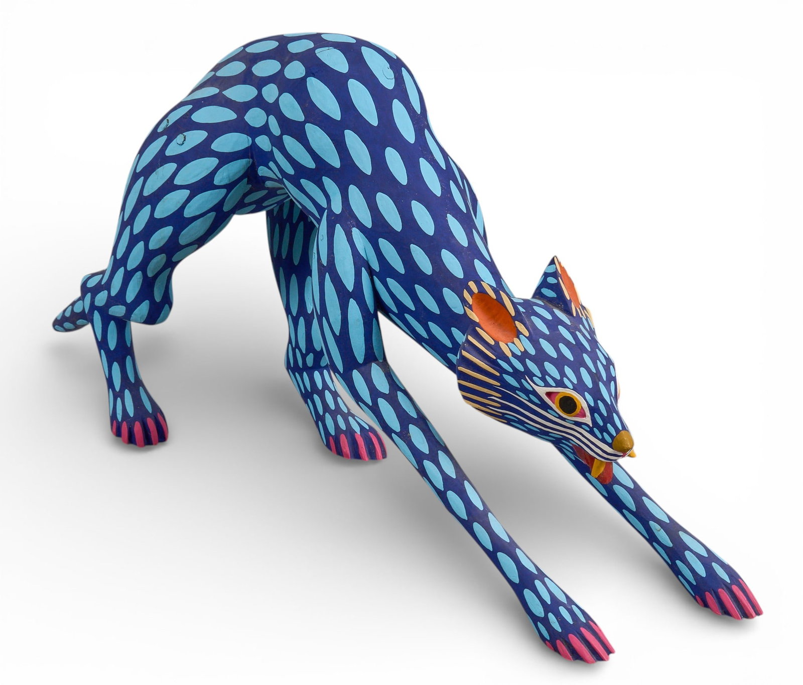 Jimenez Familia, Alebrije Cat: Jimenez Familia (San Martín Tilcajete, Oaxaca) hand-carved and painted cat alebrije sculpture, with hand-painted designs, signed on bottom by Manuel Jimenez, Angelico Jimenez, and Isaias Jimene