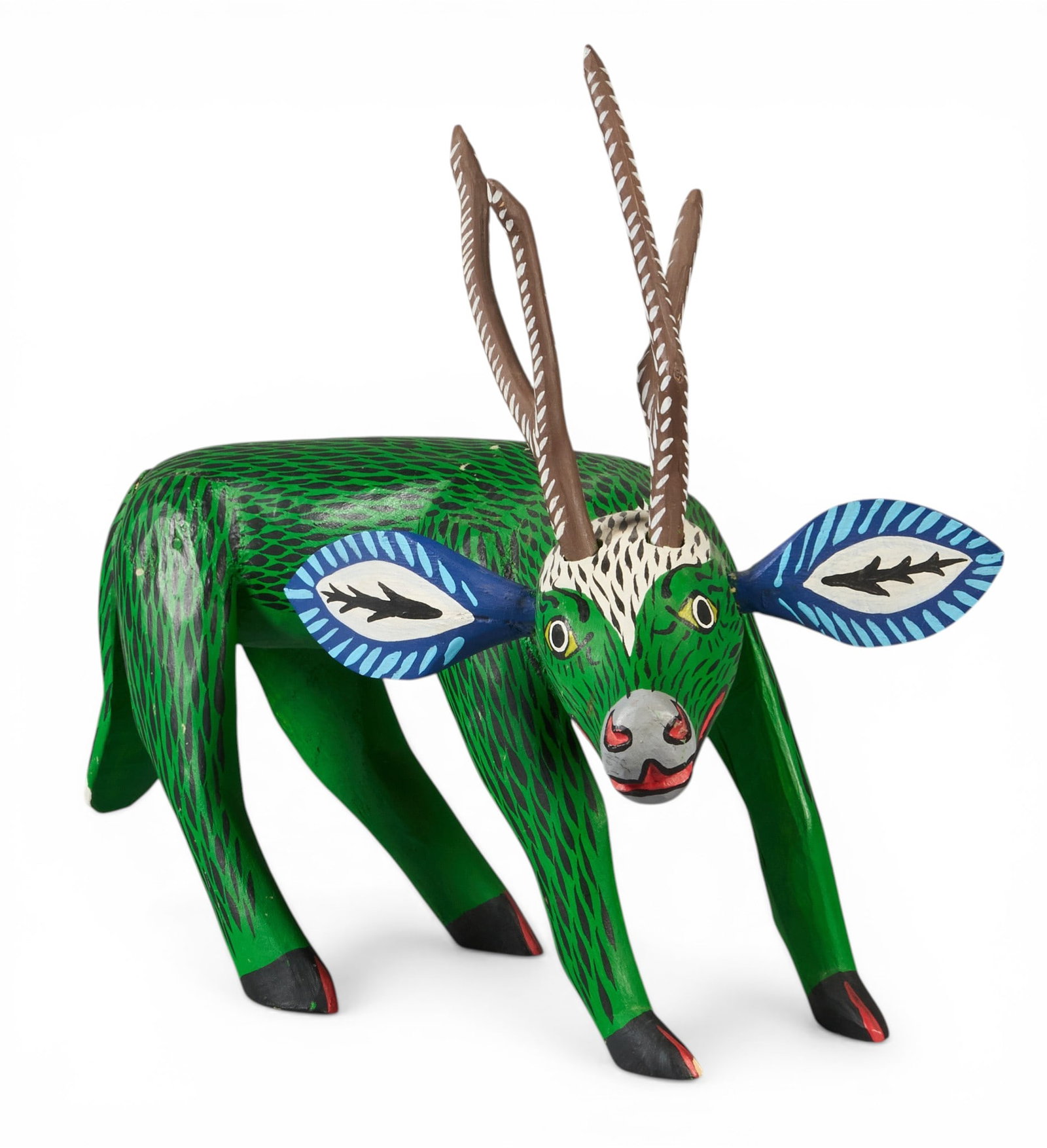 Alejandrino Fuentes, Deer Alebrjie: Alejandrino Fuentes (San Martin Tilcajete, Ocotlan, Oaxaca, Mexico, 20th century) hand-carved and painted deer alebrije, signed on bottom height 14 in. x width 16 in. x depth 9 in. Provenance: P