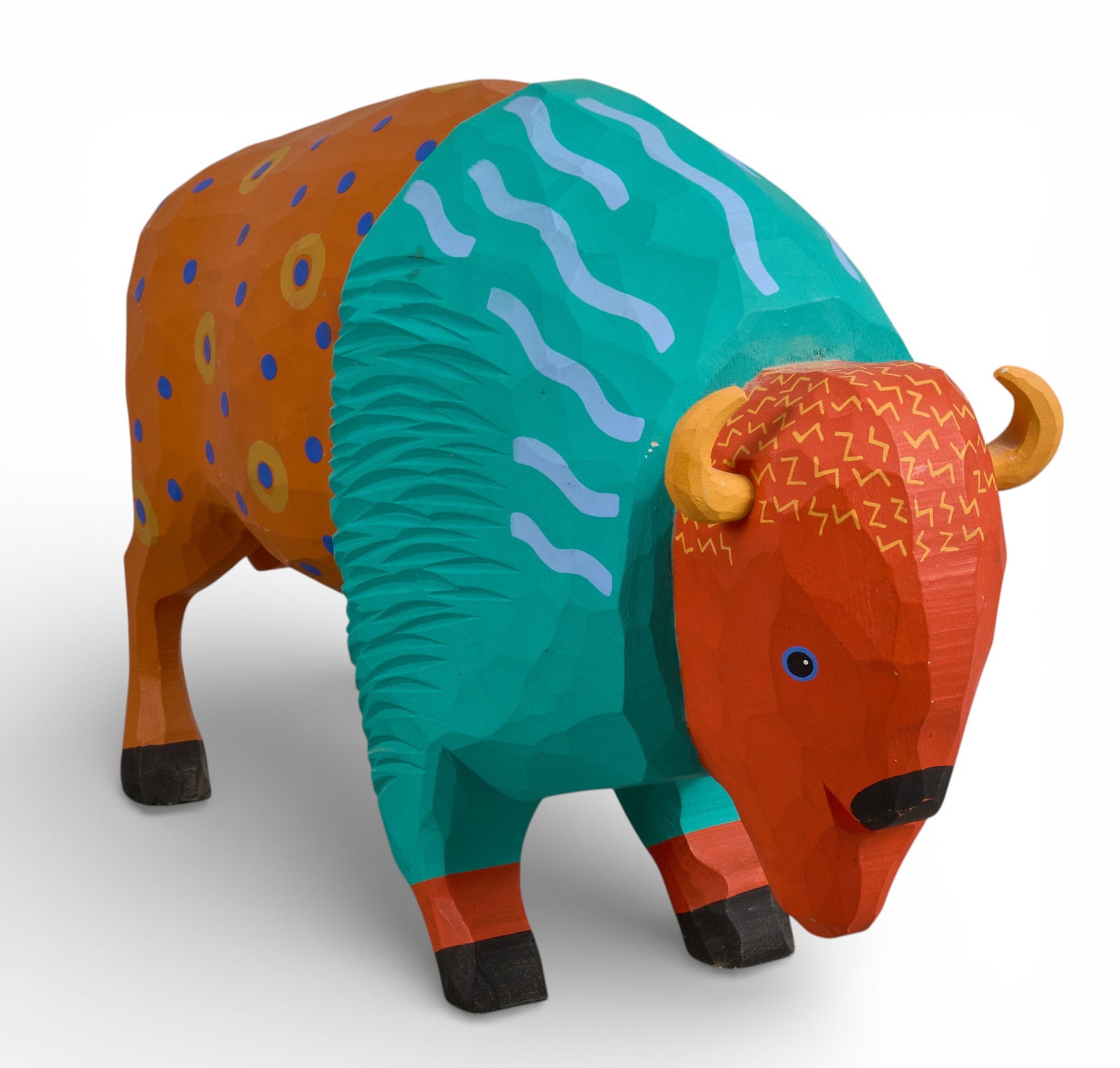 Mexican Alebrije Buffalo: Hand-carved and painted alebrije buffalo figure, dated 1990, numbered ed. 44/250 height 11.5 in. x width 5 in. x depth 18.5 in. Provenance: Property from a home in Goldthwaite, Texas