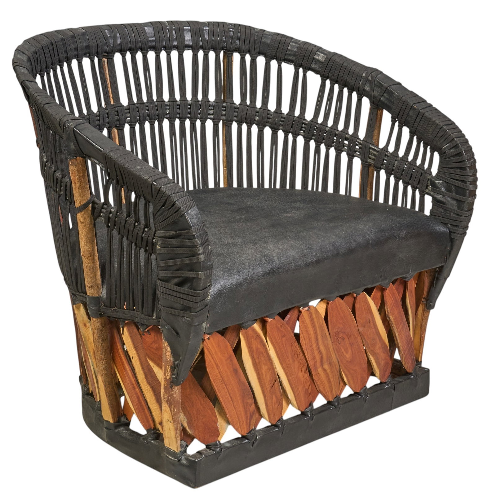 Vintage Mexican Equipale Chair: Mexican equipale barrel chair with black leather upholstery, and woven Mexican cedar base, circa 20th century height 37 in. x width 38 in. x depth 29 in. Provenance: Property from the home of a S