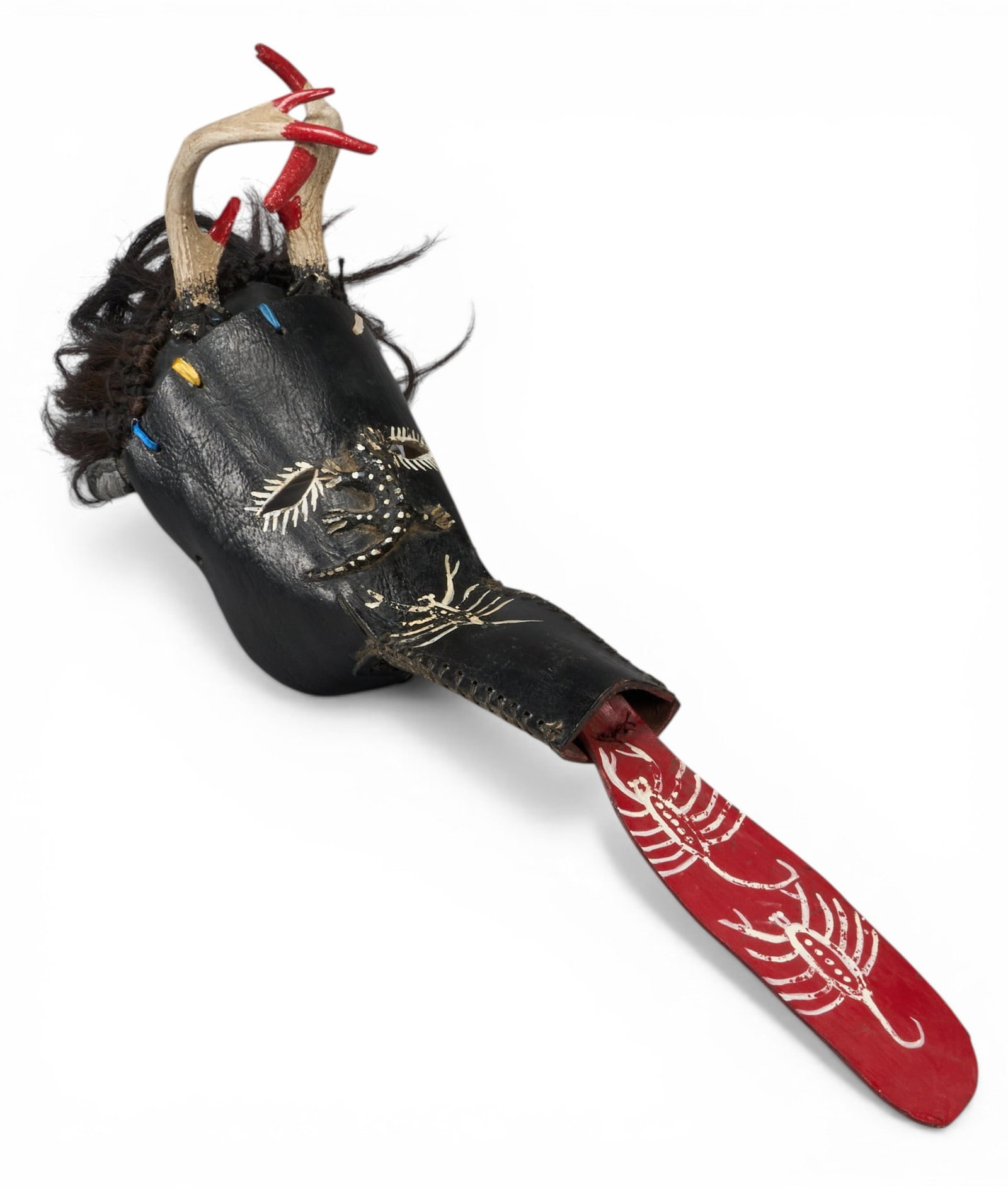 Mexican Dance Mask: Vintage Mexican dance mask, stitched leather construction with painted animal horns, hair, and rubber tongue, circa mid-20th century height 32 in. x width 9 in. x depth 16 in. Provenance: The Es