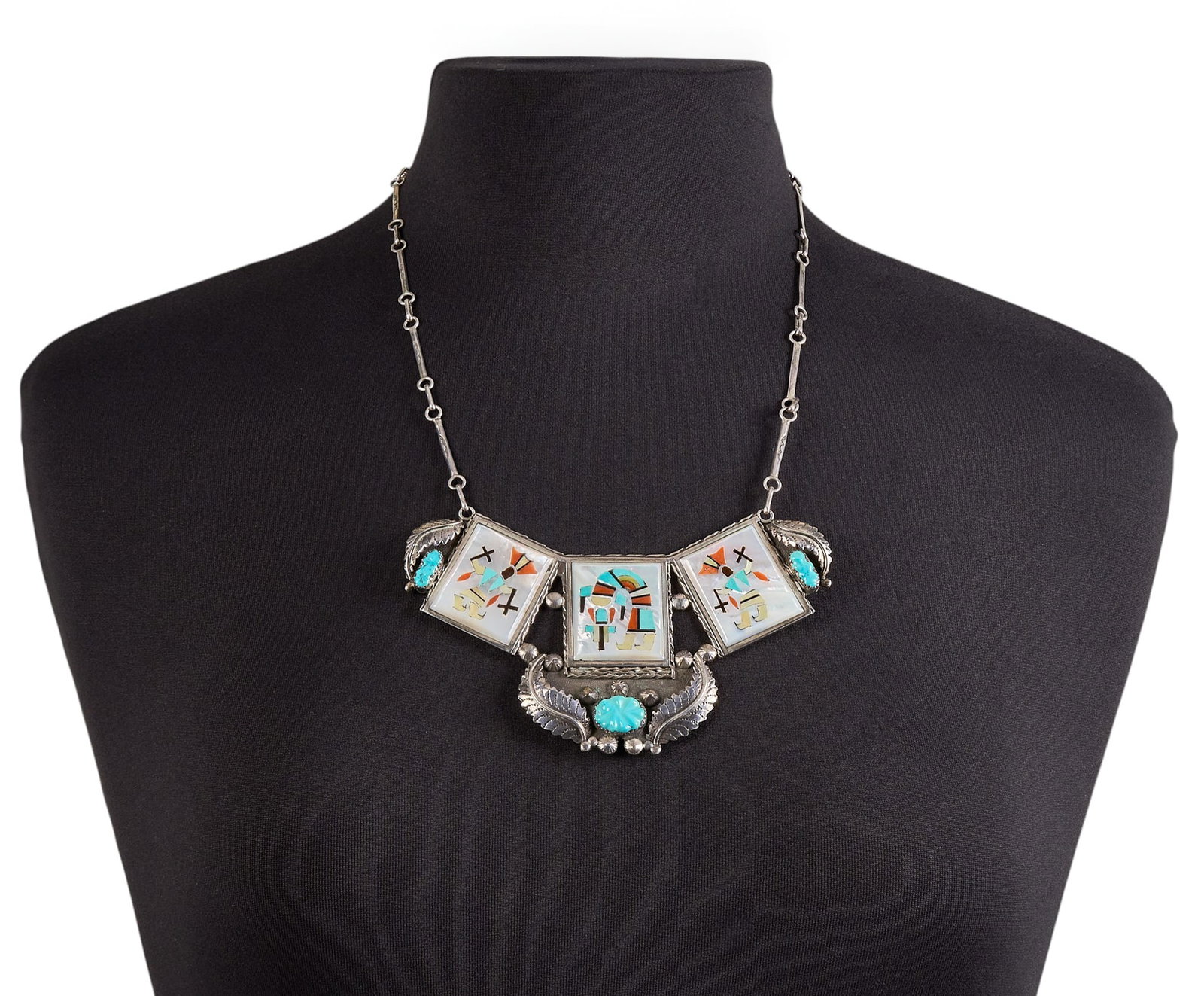 F&L Panteah, Zuni Sterling & Multi-Stone Inlay Necklace: Florentine and Lela Panteah, Zuni sterling silver necklace depicting various traditional figural motifs, with multi-stone inlay featuring mother of pearl, turquoise, coral, onyx, and shell, with feath