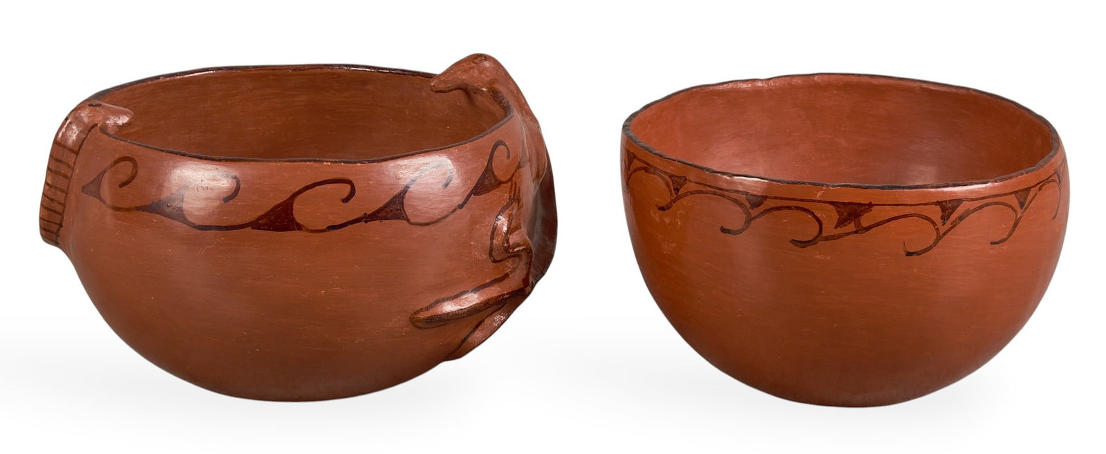 (2) Santa Clara Redware Bowls: Two Santa Clara redware pottery bowls, with hand-painted geometric motifsheight 6.5 in. x width 10.5 in. x depth 9.5 in. / largestProvenance: Property from the personal archive of a life-long