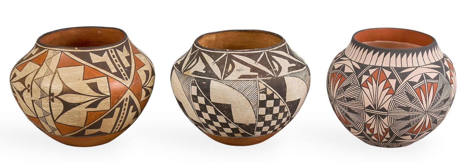 (3) Acoma Pueblo Pottery Vessels: Three Acoma Pueblo pottery vessels, featuring geometric designs in black, white, and orangeheight 6.5 in. x diameter 8 in. / largestProvenance: Property from the personal archive of a life-long