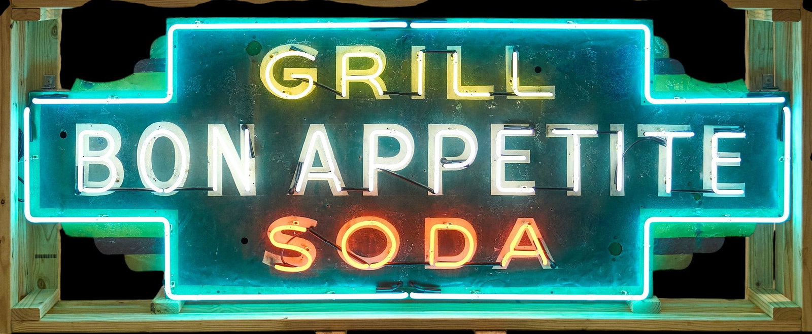 Grill Bon Appetite Neon Sign: Custom-made bar and grill sign with "Grill, Bon Appetite, Soda" lettering, with custom-made shipping crate height 35 in. x width 95.5 in. x depth 4 in. Provenance: Property from