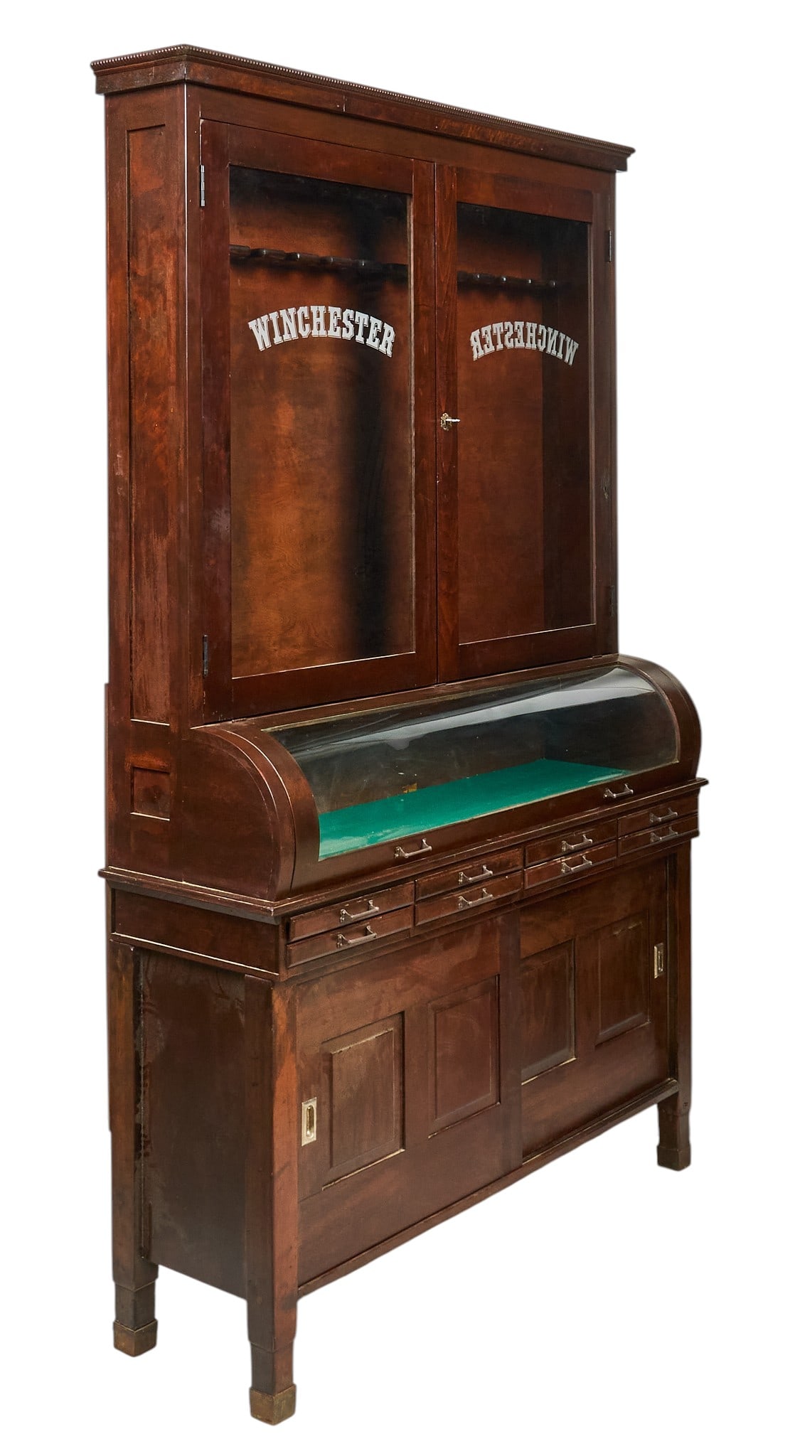 Winchester Gun Cabinet: Two-piece gun cabinet with top glass-front cabinet with "Winchester" lettering, glass cylinder top, and bottom storage, supported on block legs height 99 in. x width 62 in. x depth 20 in.&nb