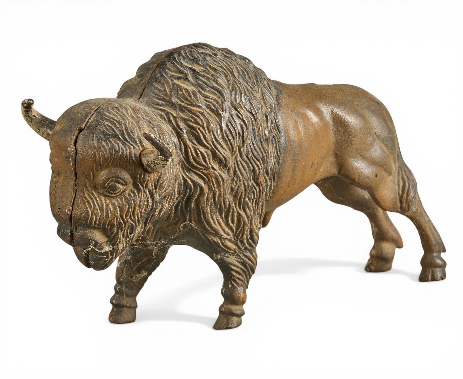Vintage Cast Iron Buffalo: Vintage cast iron buffalo sculpture height 7 in. x width 11 in. x depth 2.5 in. Provenance: The Estate collection of late teacher and humanitarian Douglas Rhodenbaugh, from his historic downtown