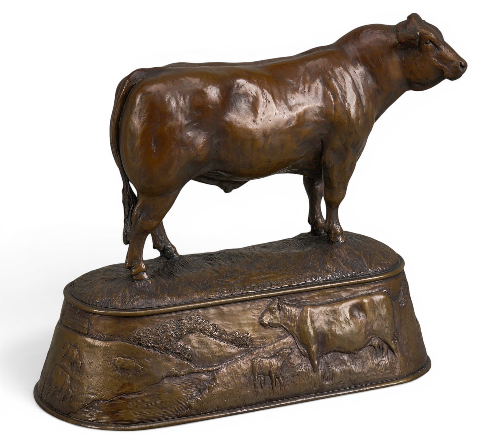 James Linthicum, Steer on Pedestal: James Linthicum (Amer., 20th-21st C.), artist-cast bronze steer on continuous sculptural bronze pedestal, with low relief frieze scenes, and incised "Seven-Forty-Seven" and signature height