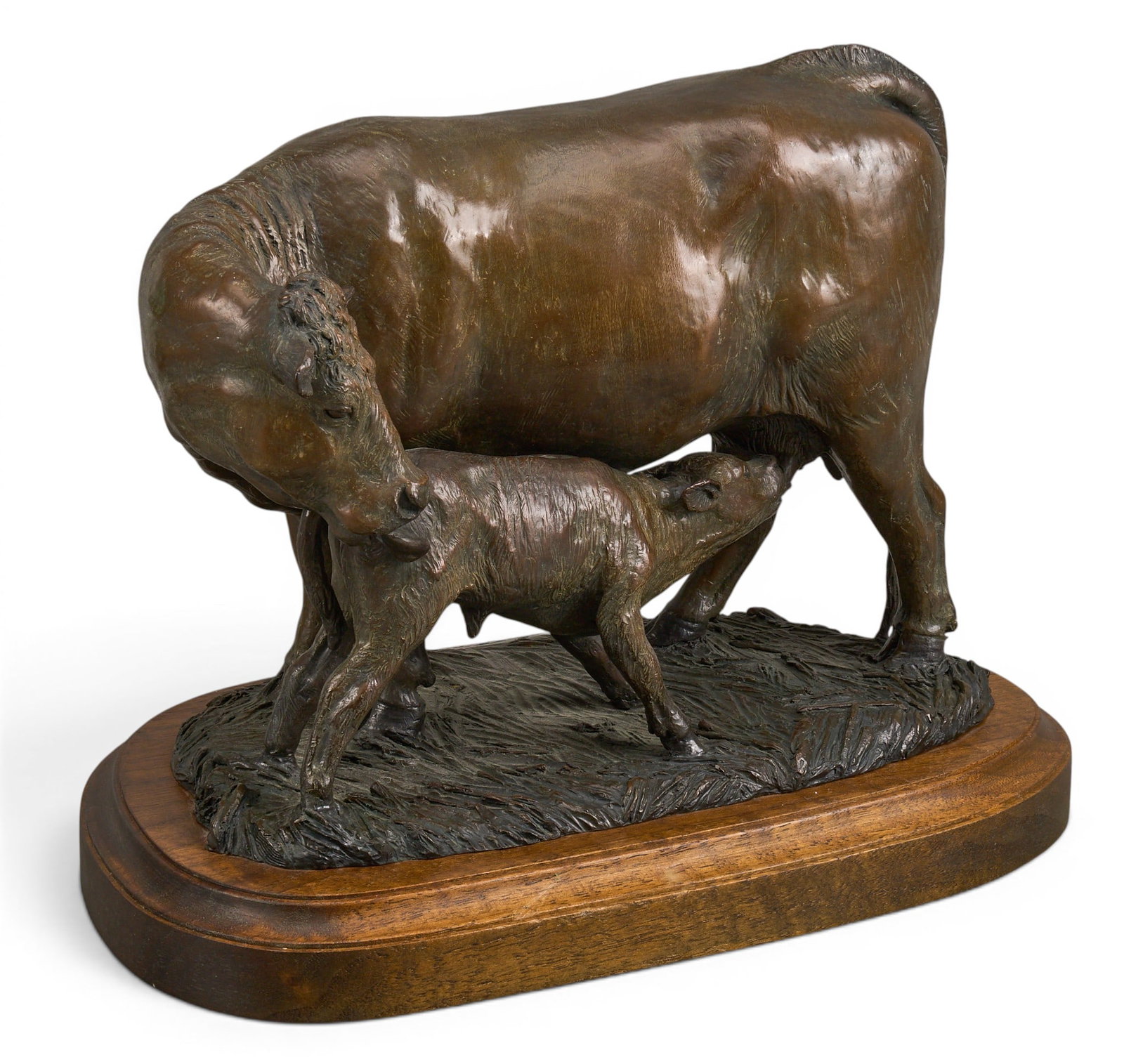 Linda Stewart, Cow and Calf: Linda S. Stewart (Canada, b. 1950), tender scene with cow and calf, artist-cast bronze sculpture on wooden base, incised signature and edition number 1/35 height 9 in. x width 12 in. x