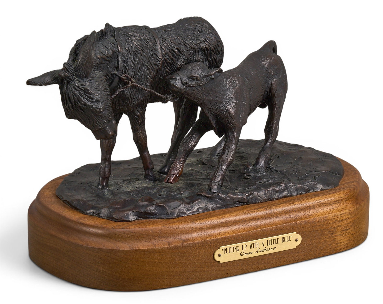 Diane Anderson, "Putting Up with a Little Bull": Diane M. Anderson (Amer., 20th-21st C.), "Putting Up with a Little Bull", artist-cast bronze sculpture on wooden base, incised signature and date, 1993 height 8 in. x width 11.5 in. x