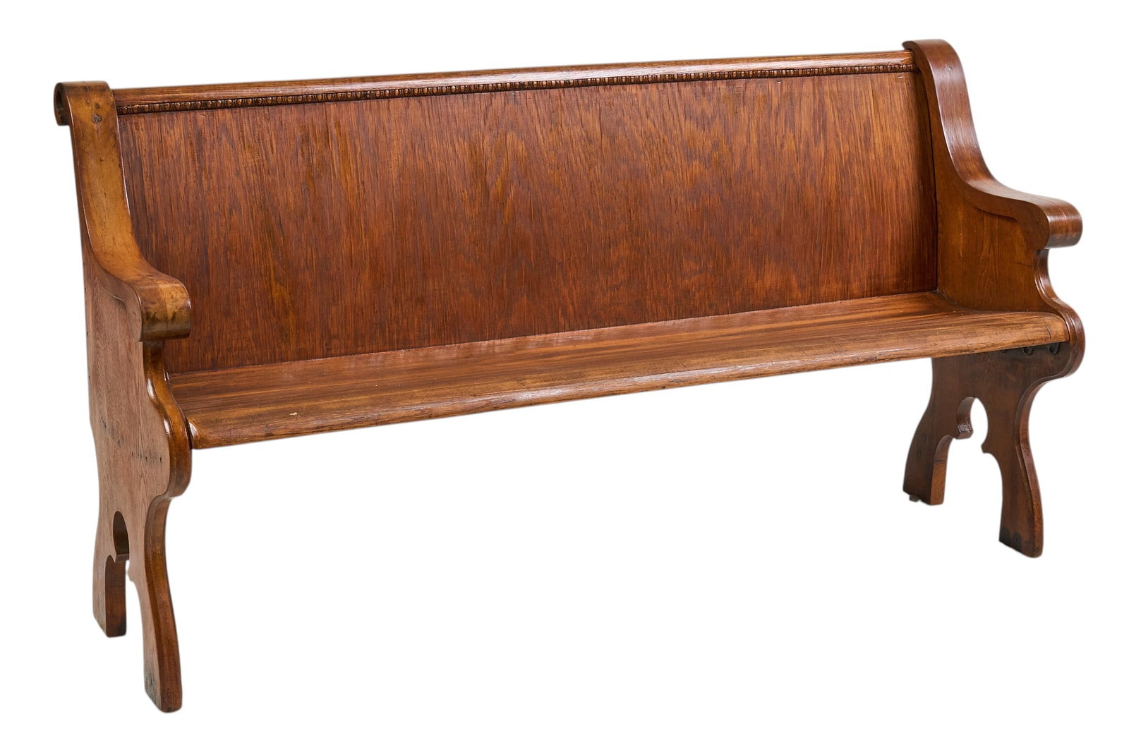 Antique Oak Pew: Antique oak pew, with scrolled armrests carved details to back height 34 in. x width 65 in. x depth 21 in. Provenance: Property from a home in Spring Branch, Texas
