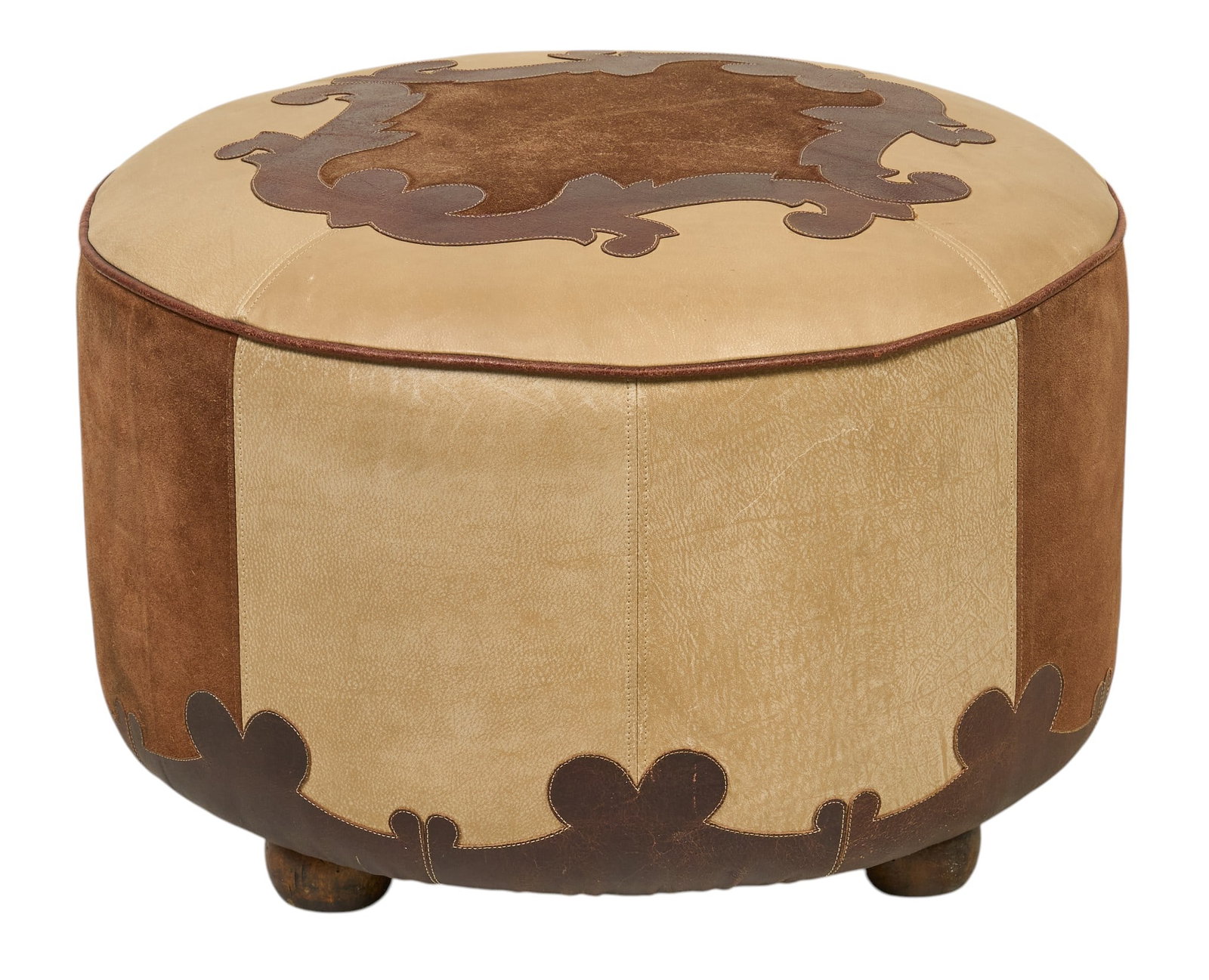 Maitland Smith Western Ottoman: Maitland Smith Western style leather and suede ottoman height 16 in. diameter 27 in. Provenance: Property from a home in San Antonio, Texas