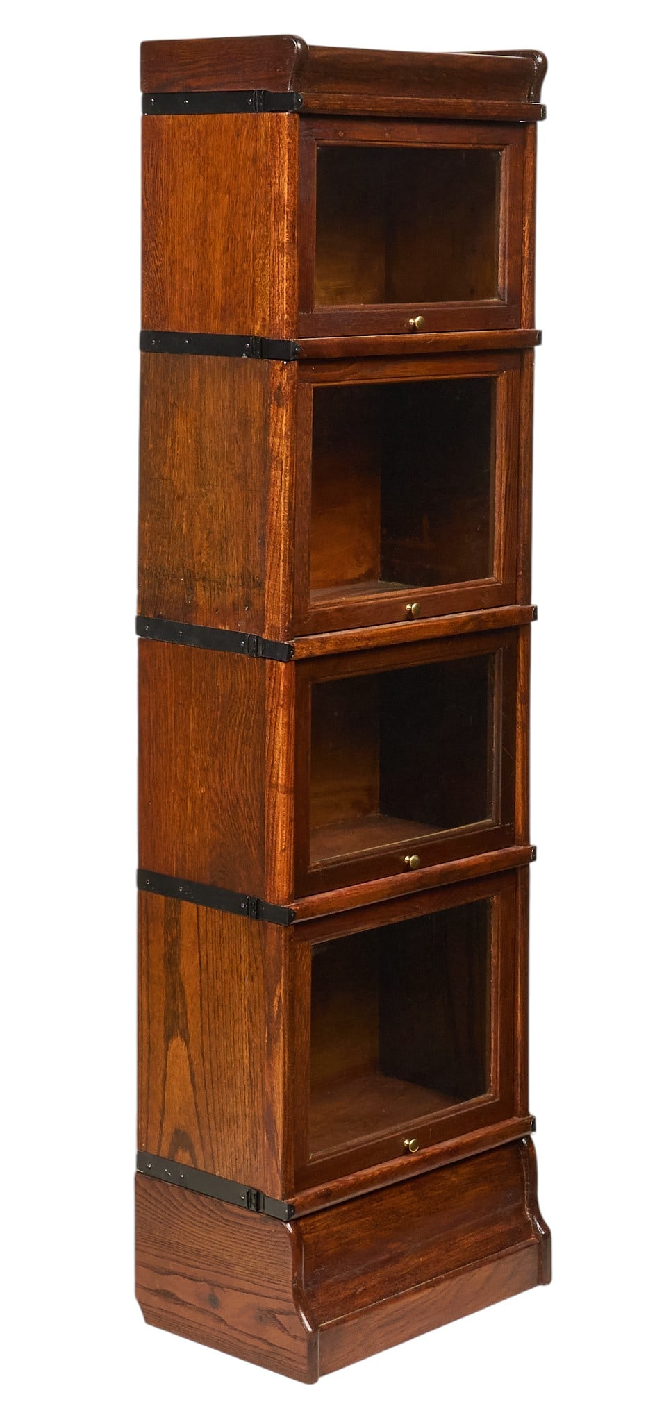 Narrow Stacking Bookcase: Narrow stacking bookcase with four glass-front modular tiers, with crown and base height 59 in. x width 10 in. x depth 17 in. Provenance: Property from a home in San Antonio, Texas