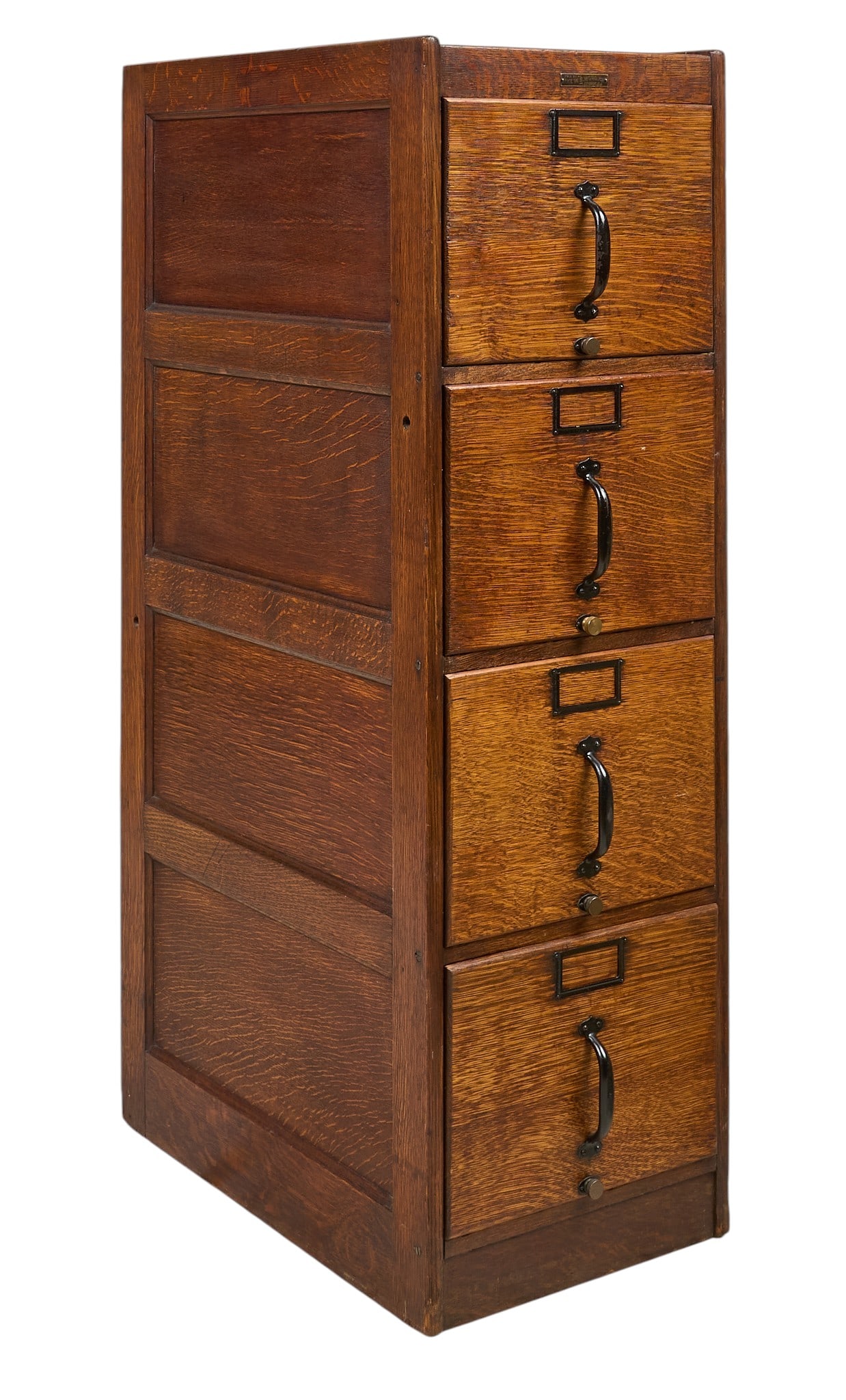 Antique Four-Drawer File Cabinet: Antique wooden filing cabinet with four drawers and original metal hardware height 51.5 in. x width 26.5 in. x depth 16 in. Provenance: Property from a home in San Antonio, Texas