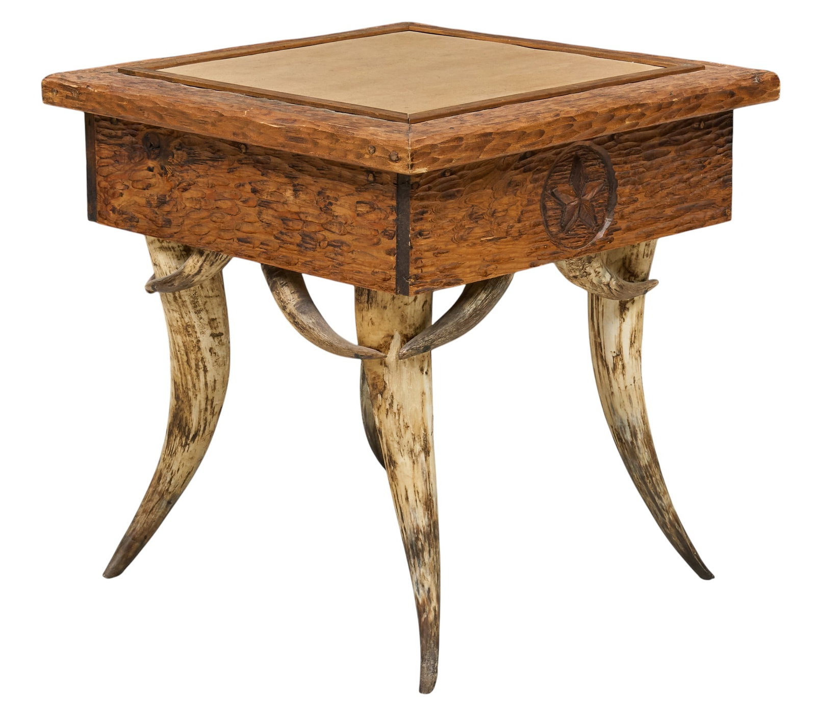 Ranch Style Steerhorn Table: Ranch style side table with carved decoration, and steer horn legs height 24 in. x width 24 in. x depth 24 in. Provenance: Property from a home in Del Rio, Texas