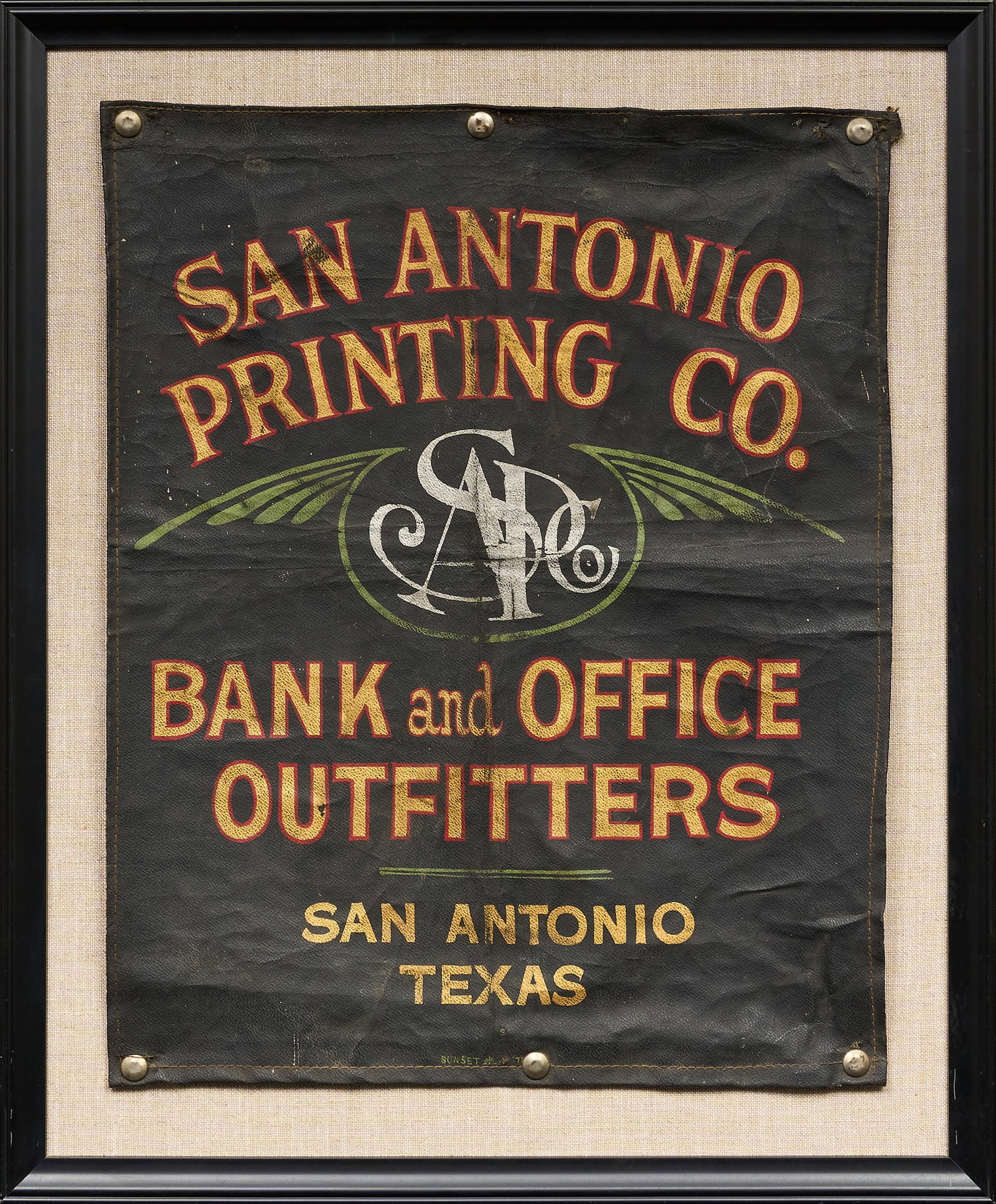 Framed San Antonio Leather Printing Co. Banner: Framed vintage painted leather advertising banner for San Antonio Printing Co., includes original photograph of company sight: 21 x 17 in., frame: 26.5 x 22 in. Provenance: Property from a home in