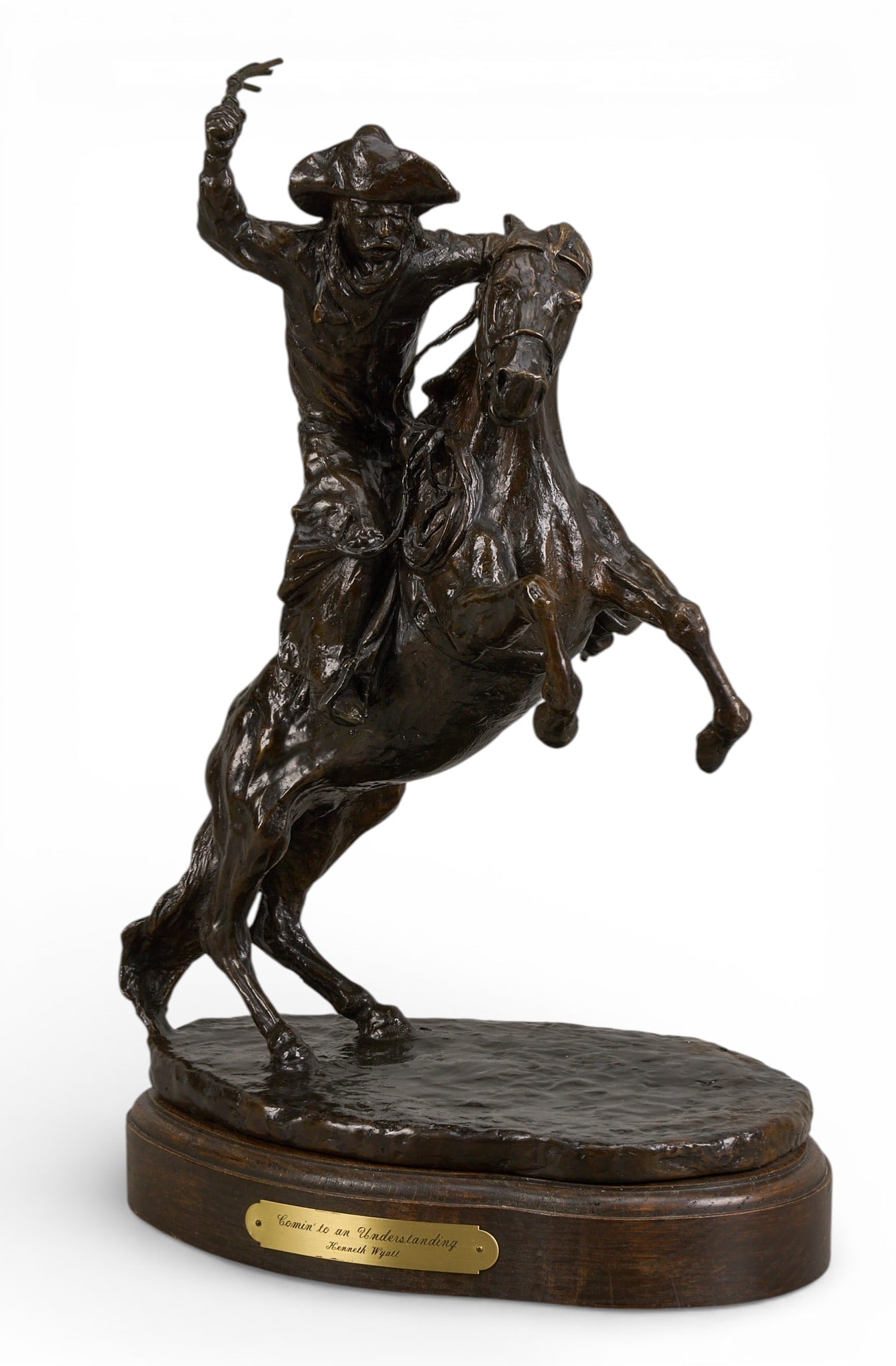 Kenneth Wyatt, "Coming to an Understanding": Kenneth Wyatt (Texas / New Mexico, 1930-2021), "Coming to an Understanding", artist-cast bronze sculpture on wooden base, incised signature and edition number, 9/20, incised foundry
