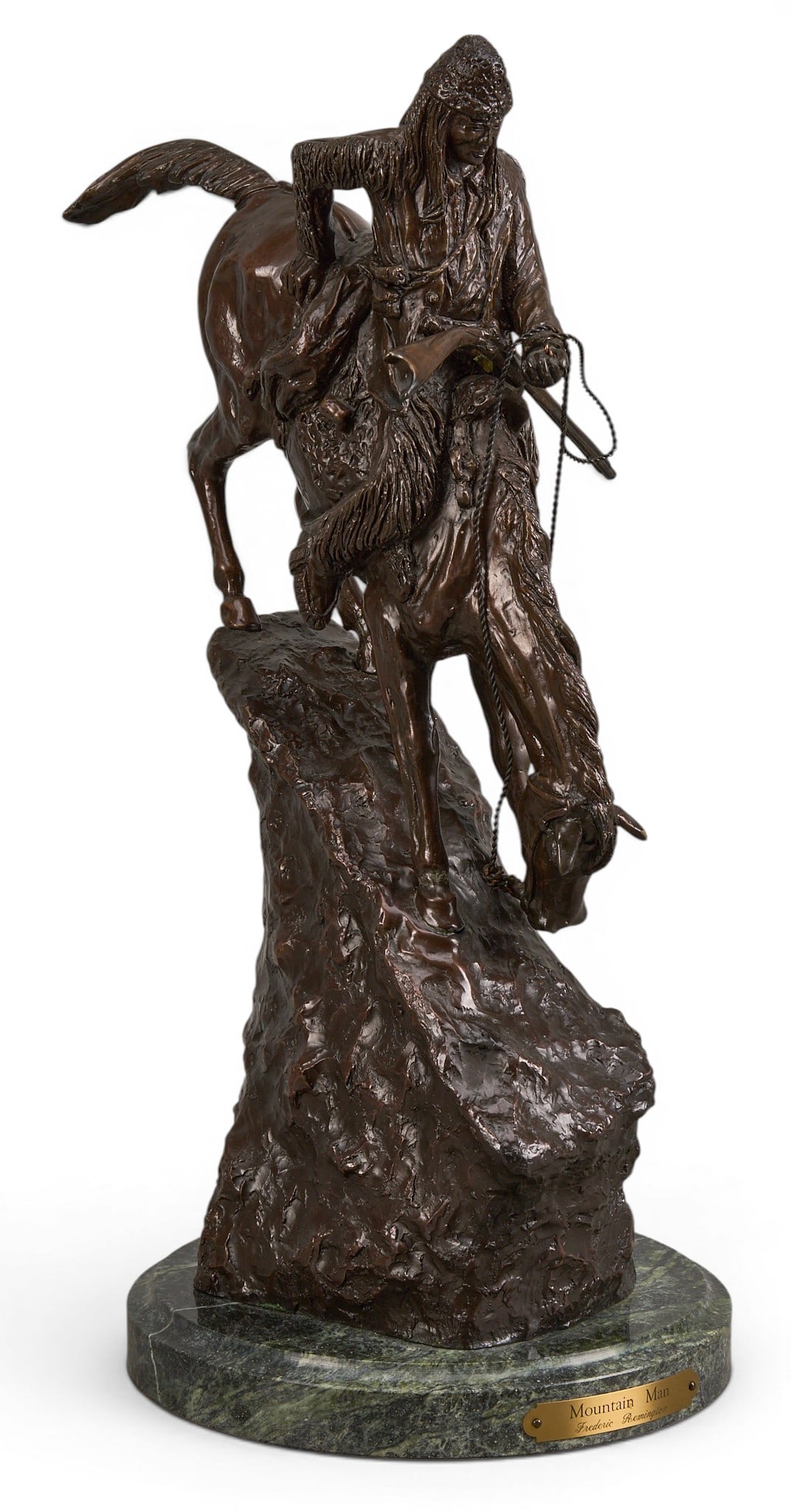 After Frederic Remington, “Mountain Man: After Frederic Remington (Canton, New York, 1861-1909), "Mountain Man”, bronze recast sculpture on green stone base height 17.5 in. x width 7.5 in. x depth 10 in. (including