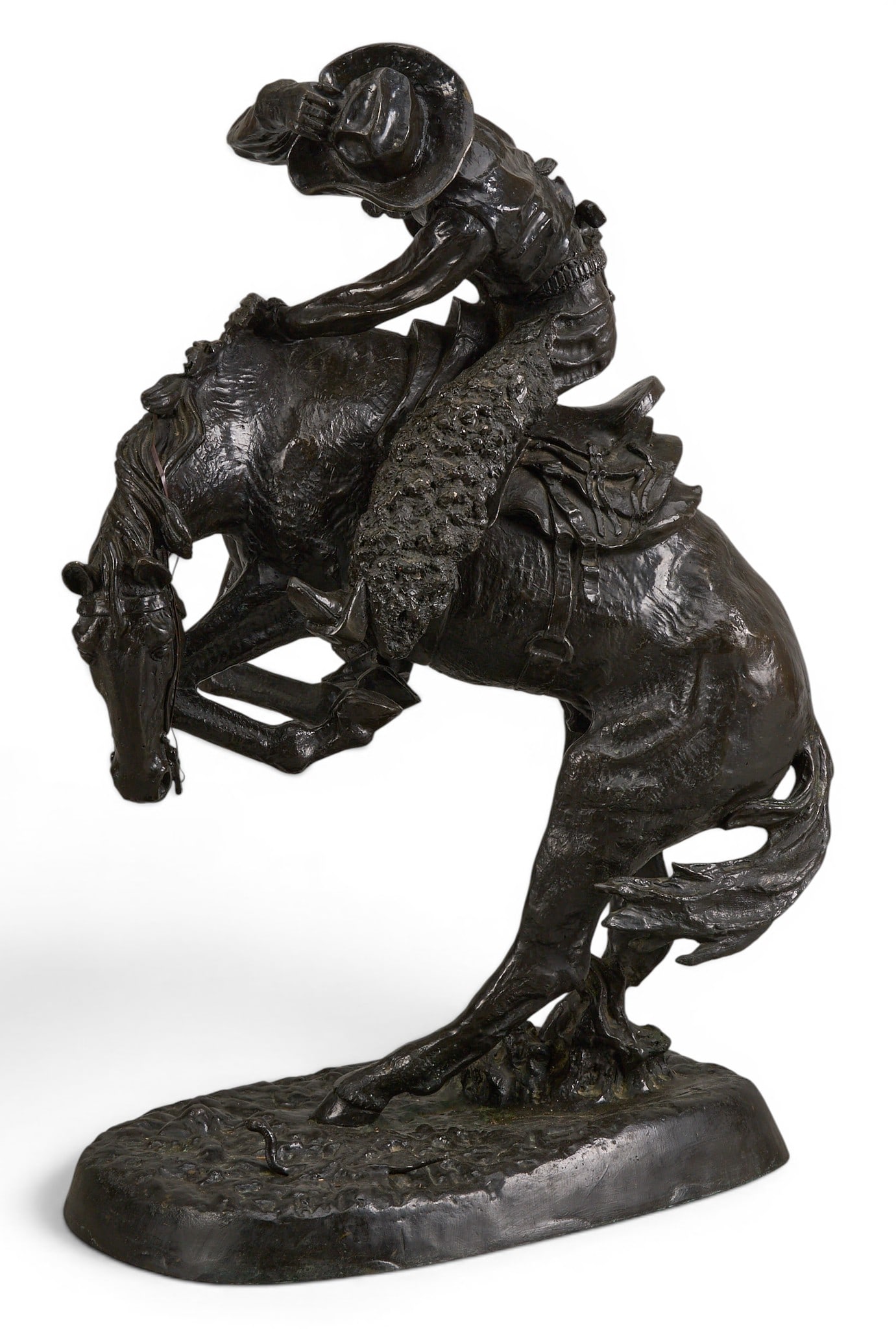 After Frederic Remington, "The Rattlesnake": After Frederic Remington (Amer., 1861-1909), "The Rattlesnake", freestanding bronze recast sculpture height 32 in. x width 20 in. x depth 13 in. Provenance: Property from the Estate of