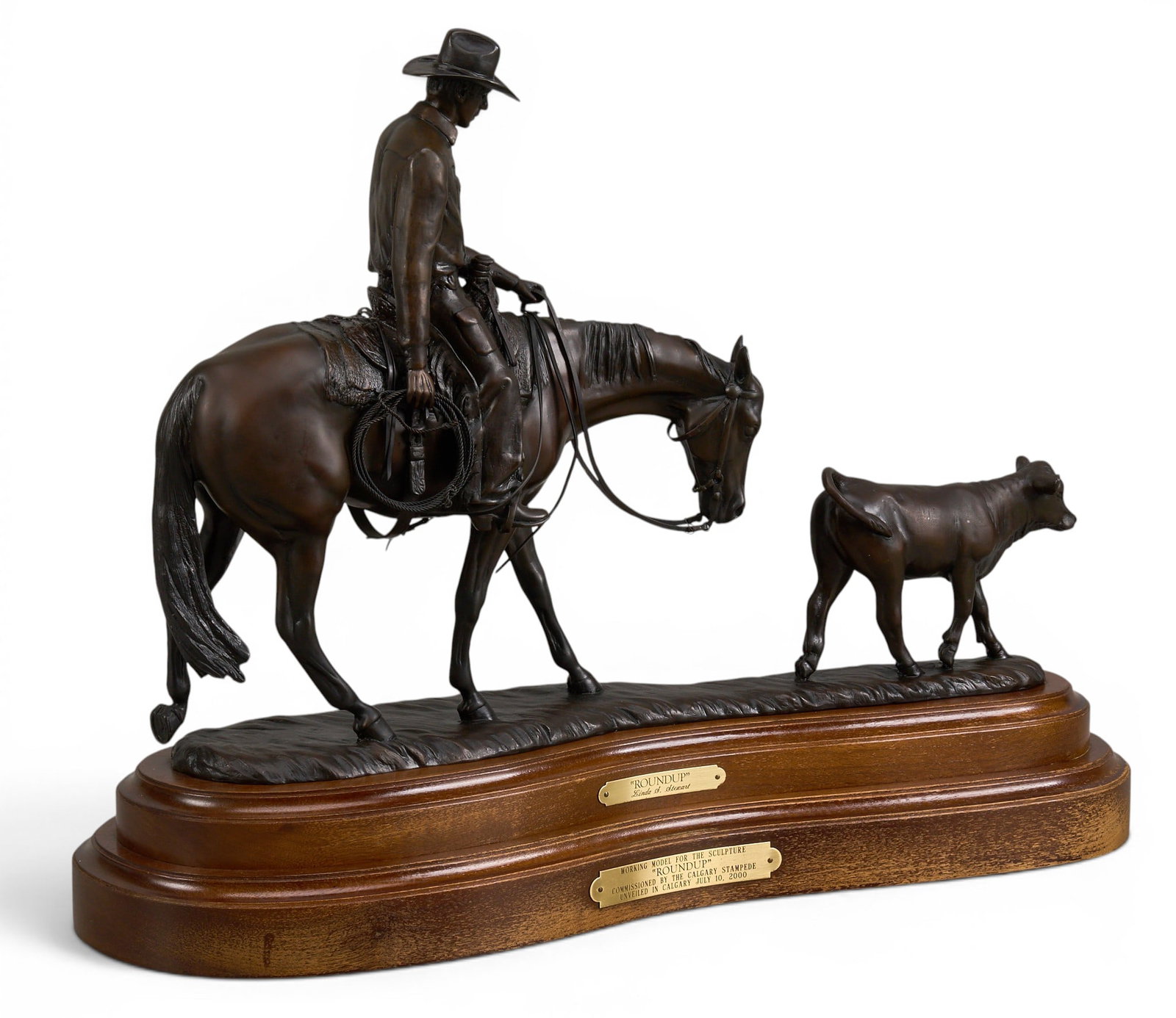 Linda Stewart, "Roundup": Linda S. Stewart (Canada, b. 1950), "Roundup", artist-cast bronze sculpture on wooden base, incised signature and edition number 40/40 height 18 in. x width 22.5 in. x depth 7.5