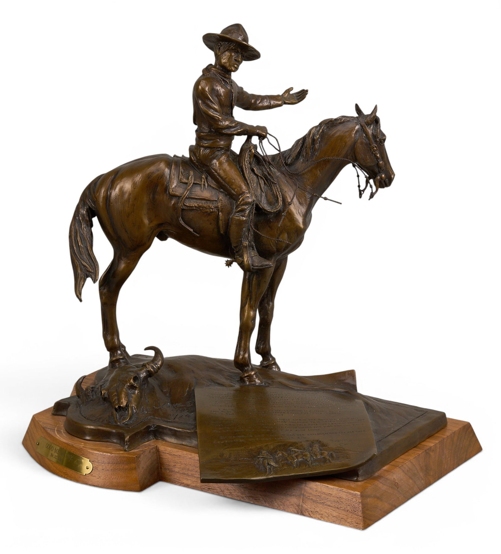 J. C. Dye, "Good Medicine": J. C. Dye (Montana, b. 1948), "Good Medicine", artist-cast bronze sculpture on wooden base, incised signature, edition number 19/20, and date, 1992 height 13.5 in. x width 13 in. x
