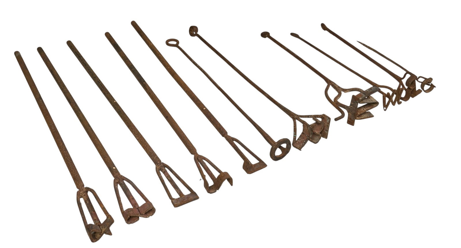 (11) Vintage Branding Irons: Collection of eleven vintage rustic iron branding irons, circa mid 20th century length 37 in. x width 3 in. x depth 2 in. / largest Provenance: Property from a home in San Antonio,