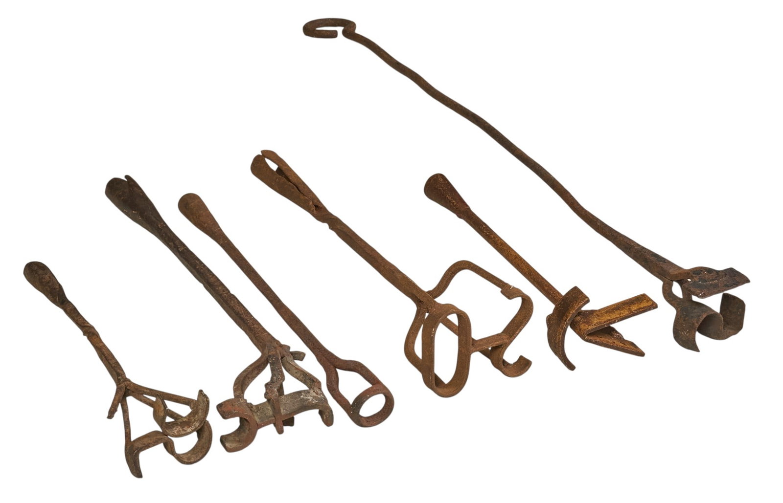 (6) Vintage Branding Irons: Collection of six vintage rustic iron branding irons, circa mid 20th century length 31 in. x width 3 in. x depth 2.5 in. / largest Provenance: Property from a home in San Antonio, Texas