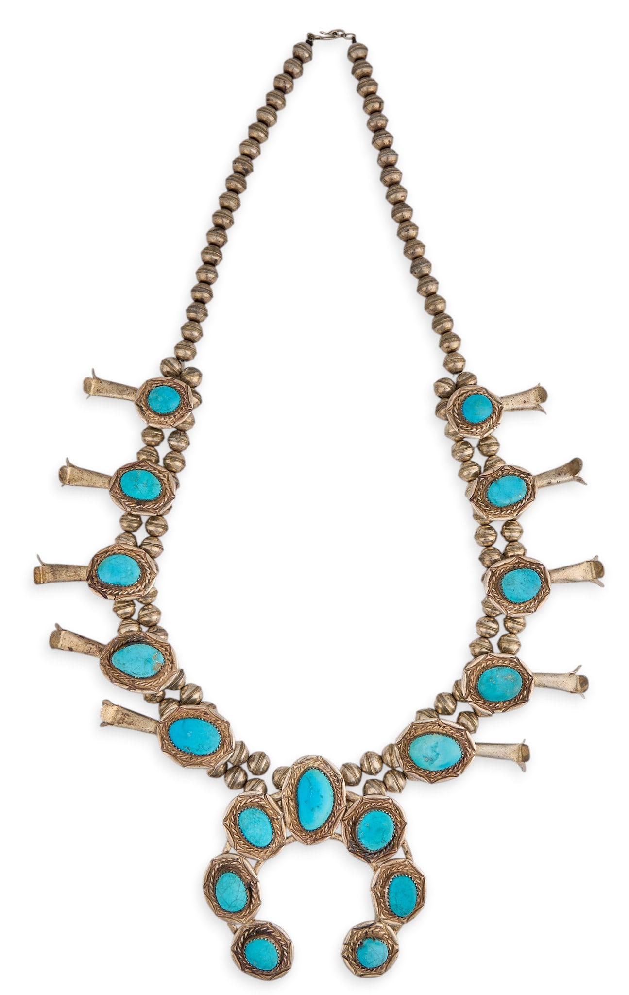 Southwestern Sterling & Turquoise Squash Blossom: Southwestern sterling silver squash blossom necklace, set with turquoise cabochons, featuring twisted rope motifs, with hook and eye closure, marked "Sterling" Length: 26 in. Total weight: 1