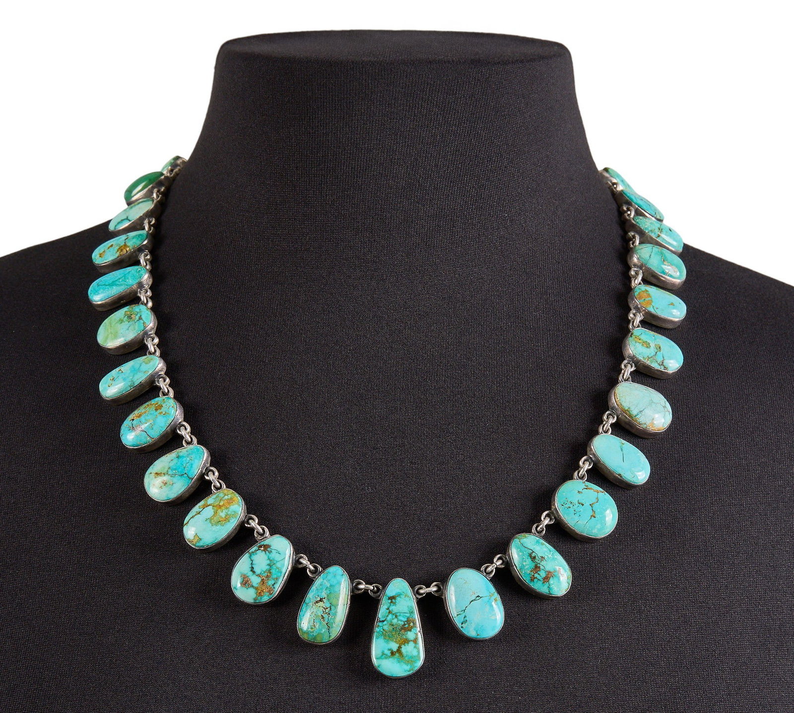 Sterling Silver & Turquoise Necklace: Sterling silver necklace, possibly by Federico Jimenez, set with turquoise cabochons, marked to reverse Length: 23 in. Total weight: 123.7 g